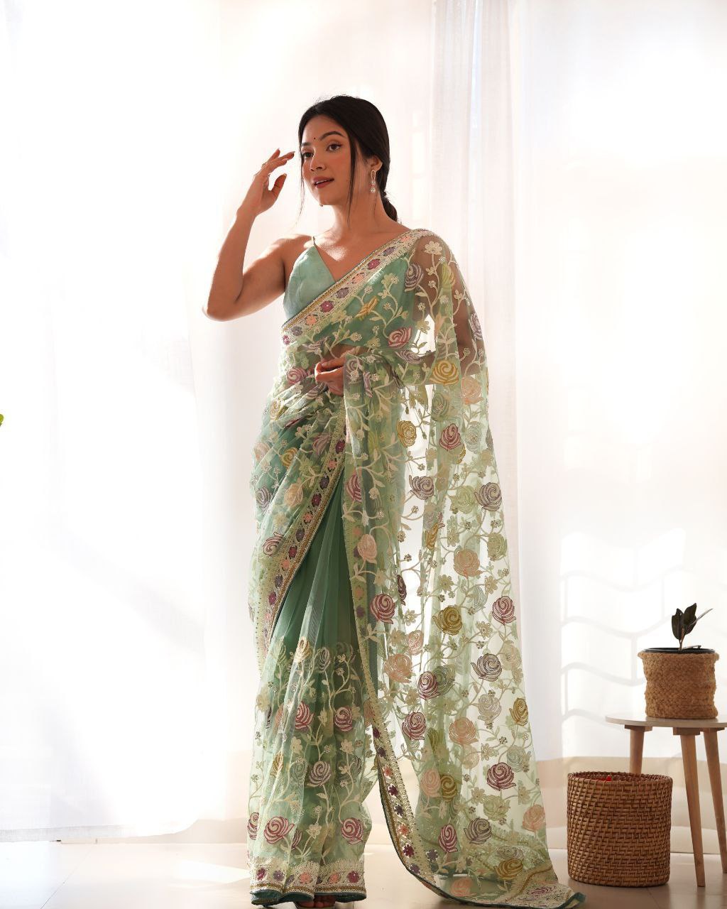 Fluttering elegance Aari embroidered butterfly net saree
