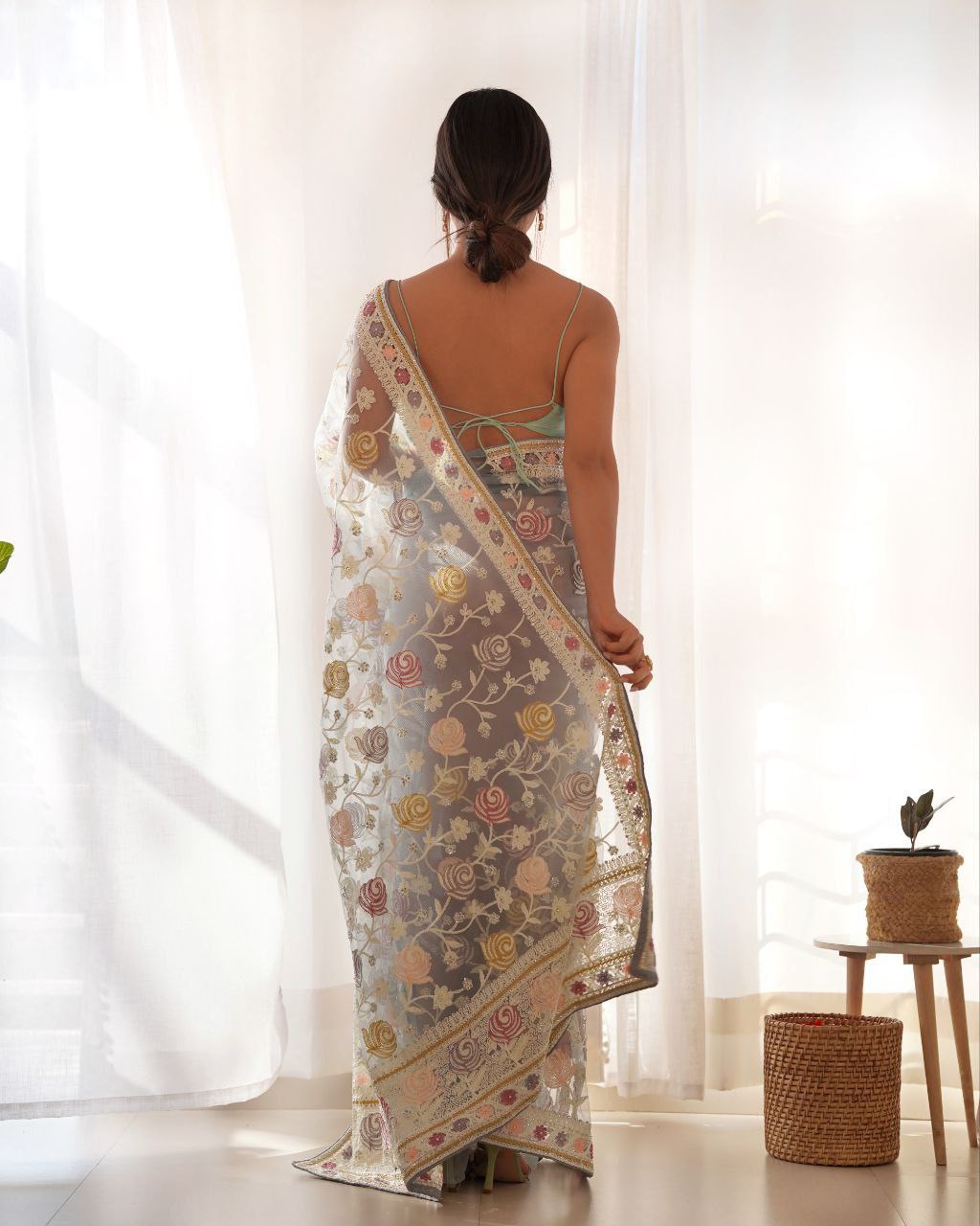 Fluttering elegance Aari embroidered butterfly net saree