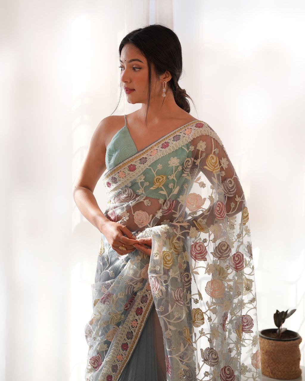 Fluttering elegance Aari embroidered butterfly net saree