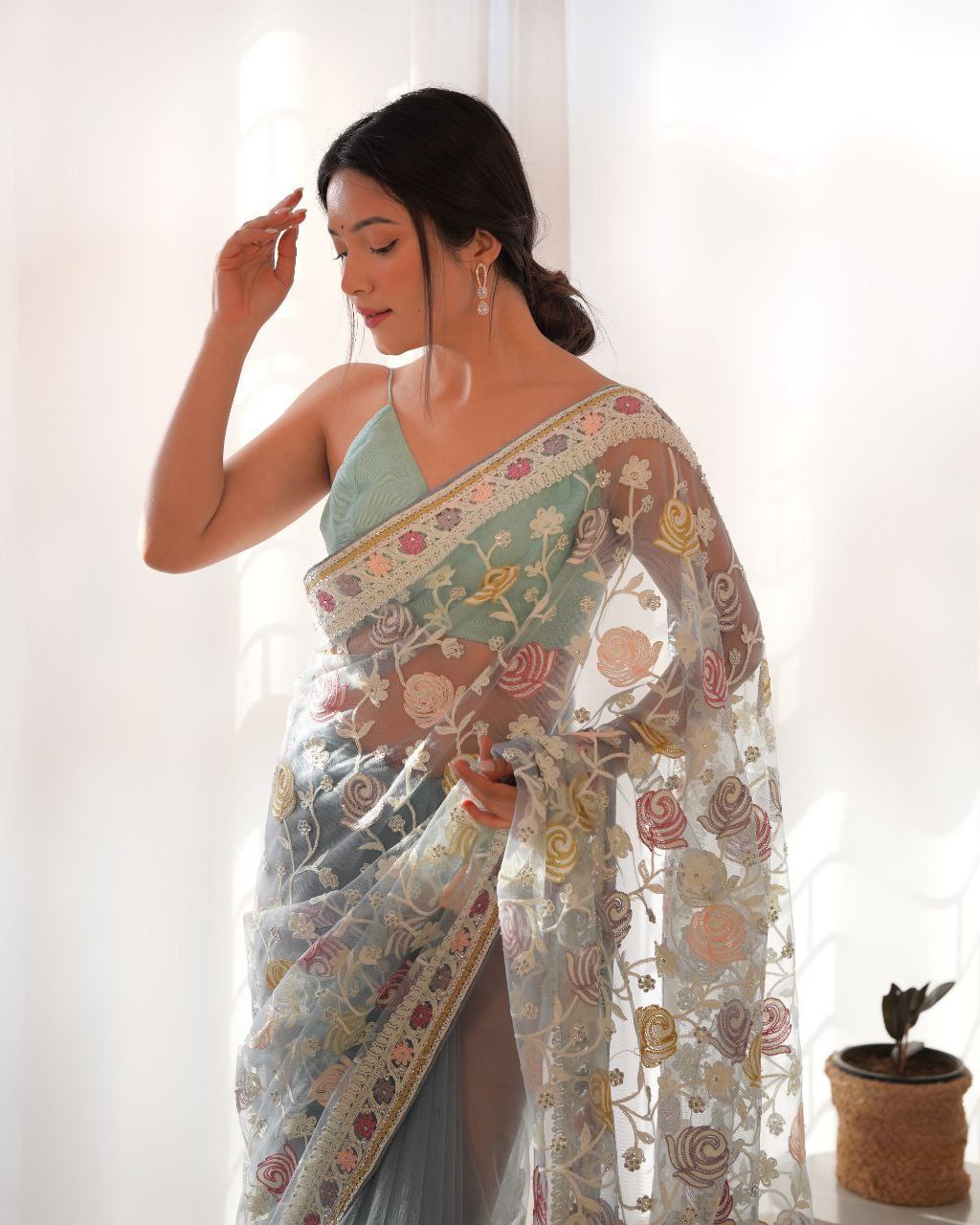Fluttering elegance Aari embroidered butterfly net saree