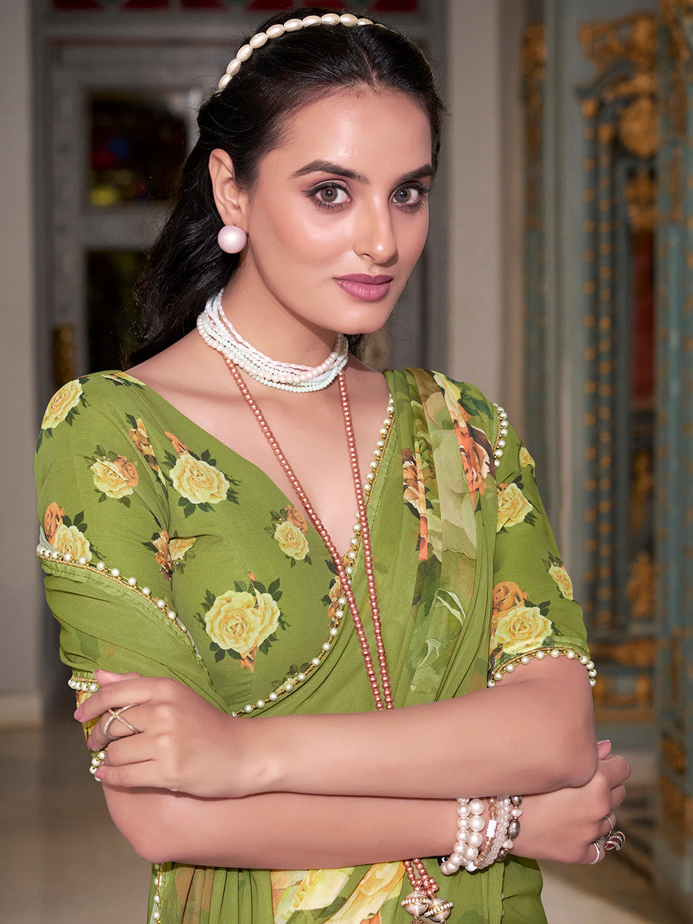 Green georgette printed saree with pearl lace border