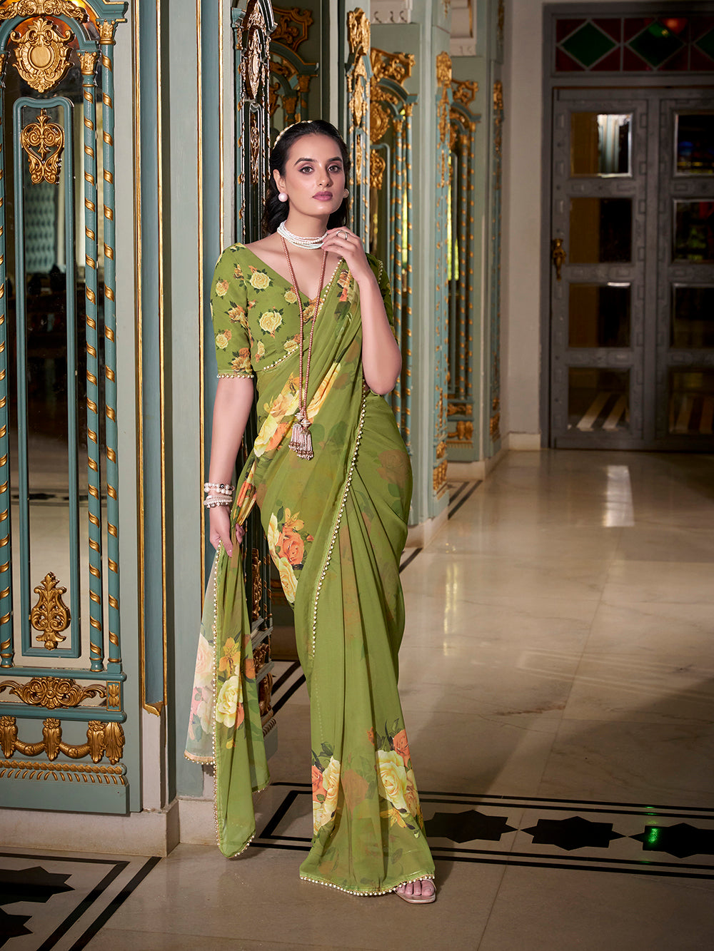 Green georgette printed saree with pearl lace border