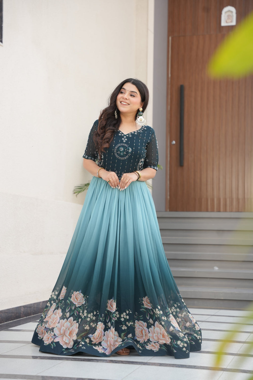 Hemrika Rama Color Embroidered Gown – designer rama green ethnic gown for women with floral digital print and beads embroidery, premium faux blooming floor-length gown, half sleeve Anarkali gown with round neckline, canvas patta stitching for extra flair, elegant Indian partywear and festive gown, fully lined with cotton for comfort, Trinaari ready to wear ethnic gown.