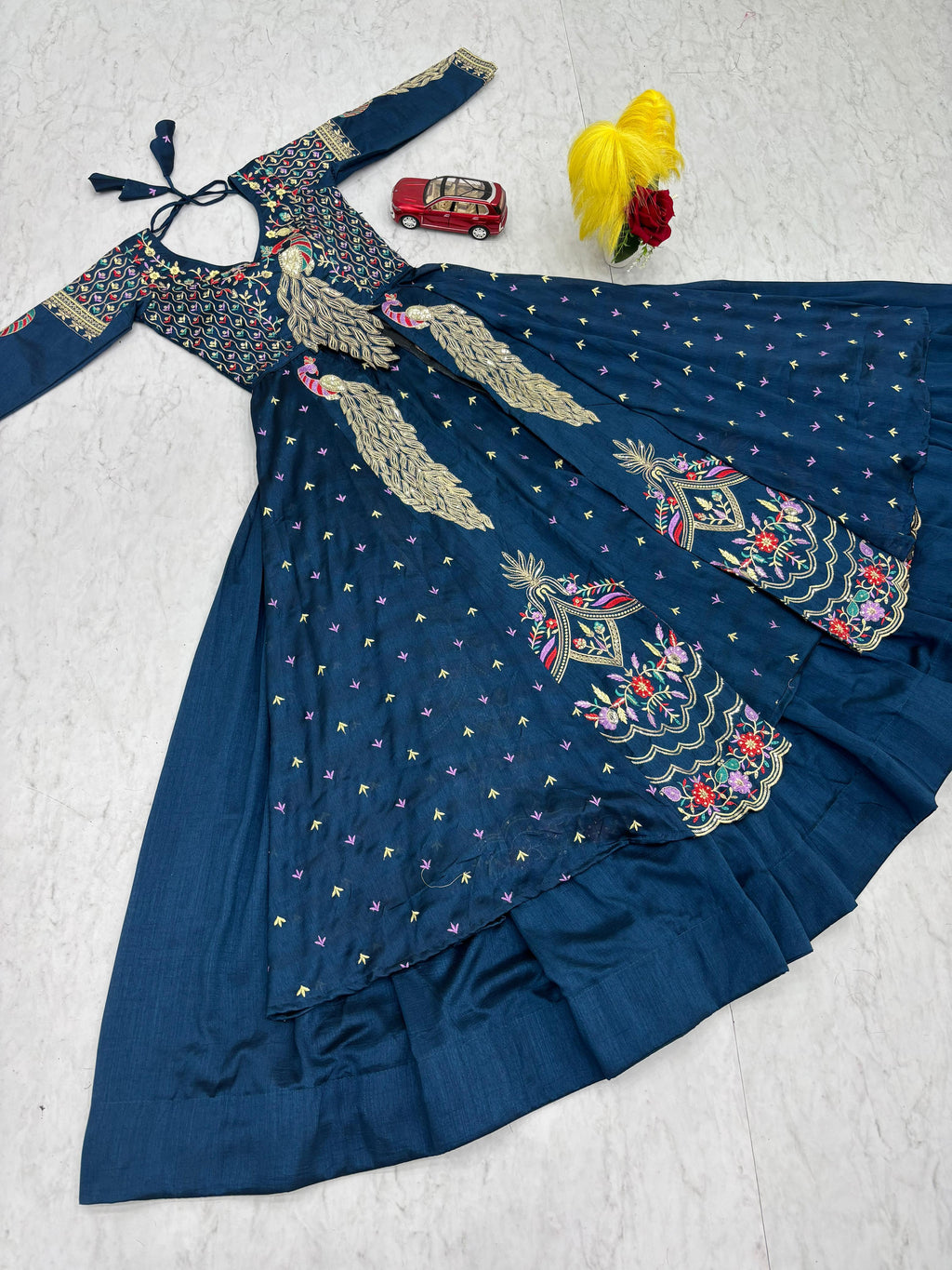Mani teal blue vichitra silk crop top peacock design lehenga with embroidered shrug