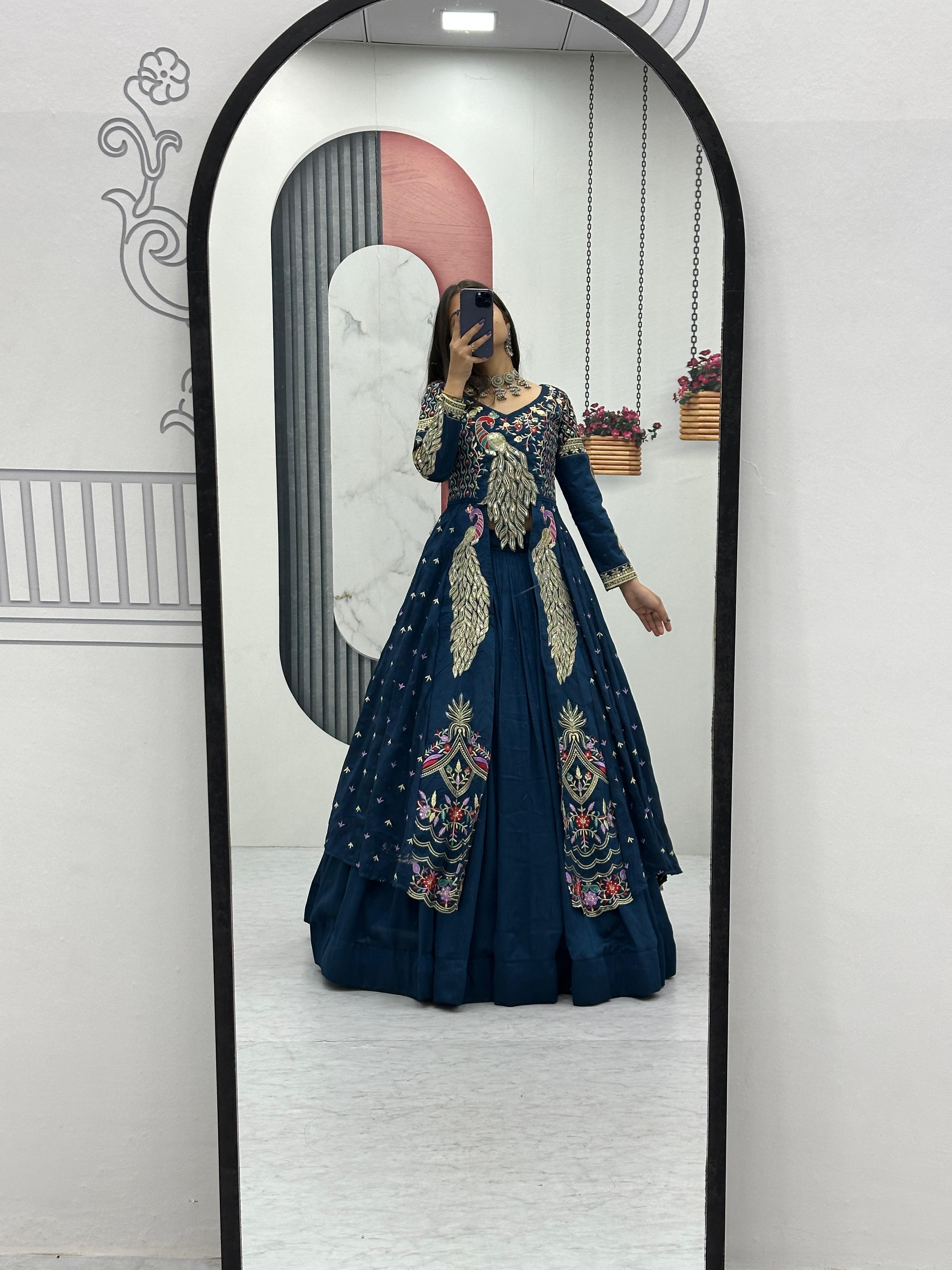 Mani teal blue vichitra silk crop top peacock design lehenga with embroidered shrug