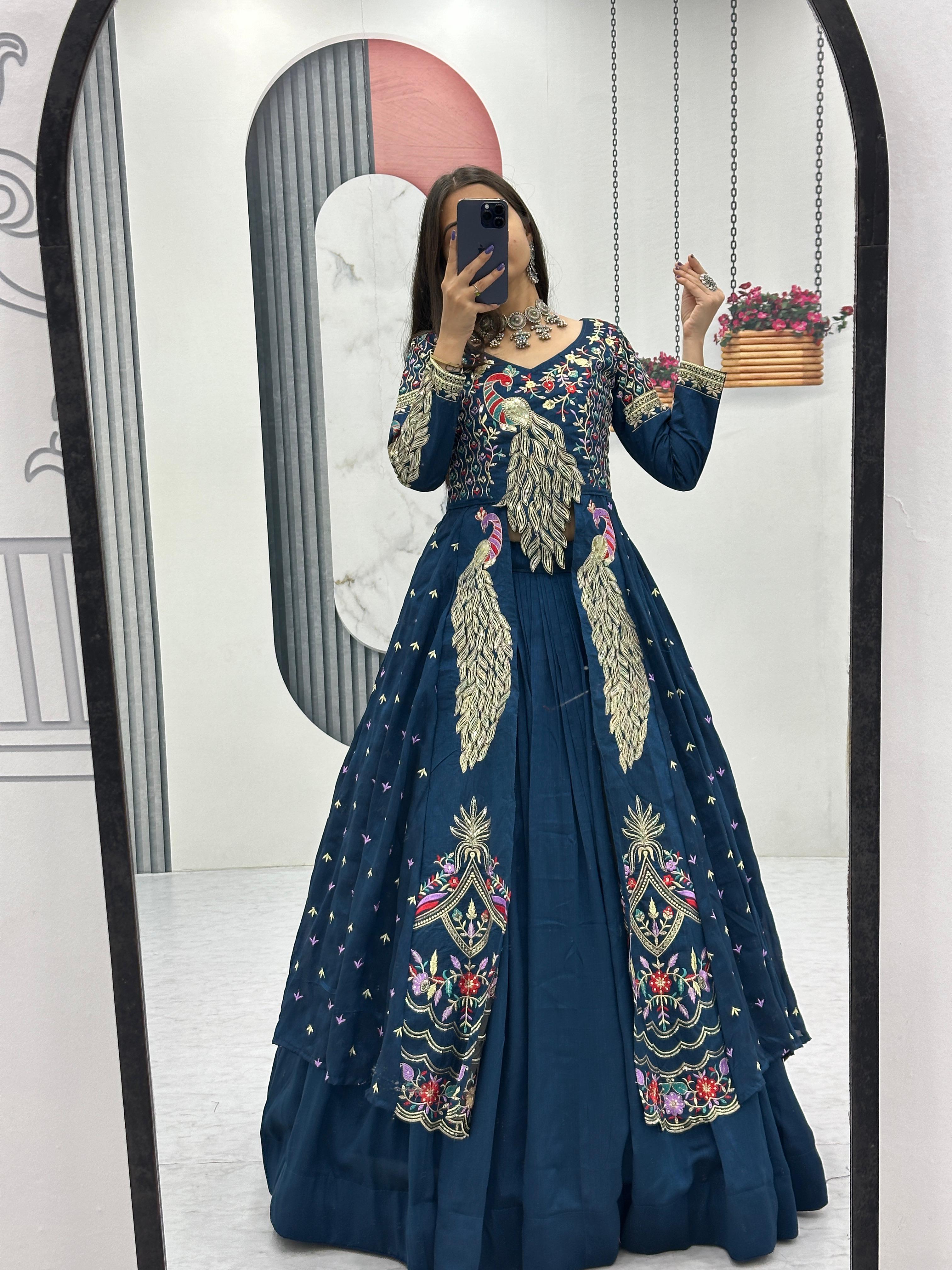 Mani teal blue vichitra silk crop top peacock design lehenga with embroidered shrug