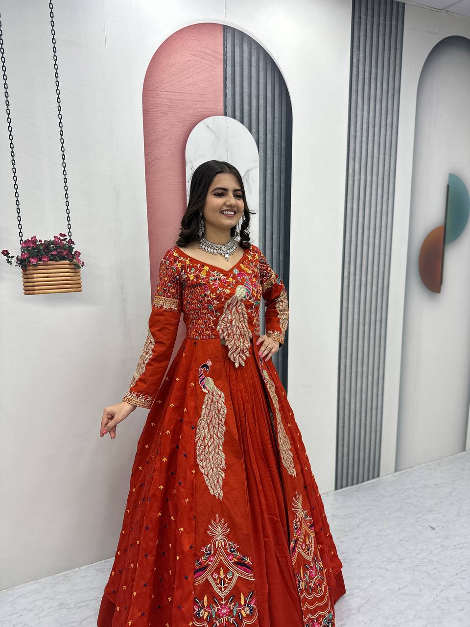 Mani orange Vichitra silk crop top peacock design lehenga with embroidered shrug