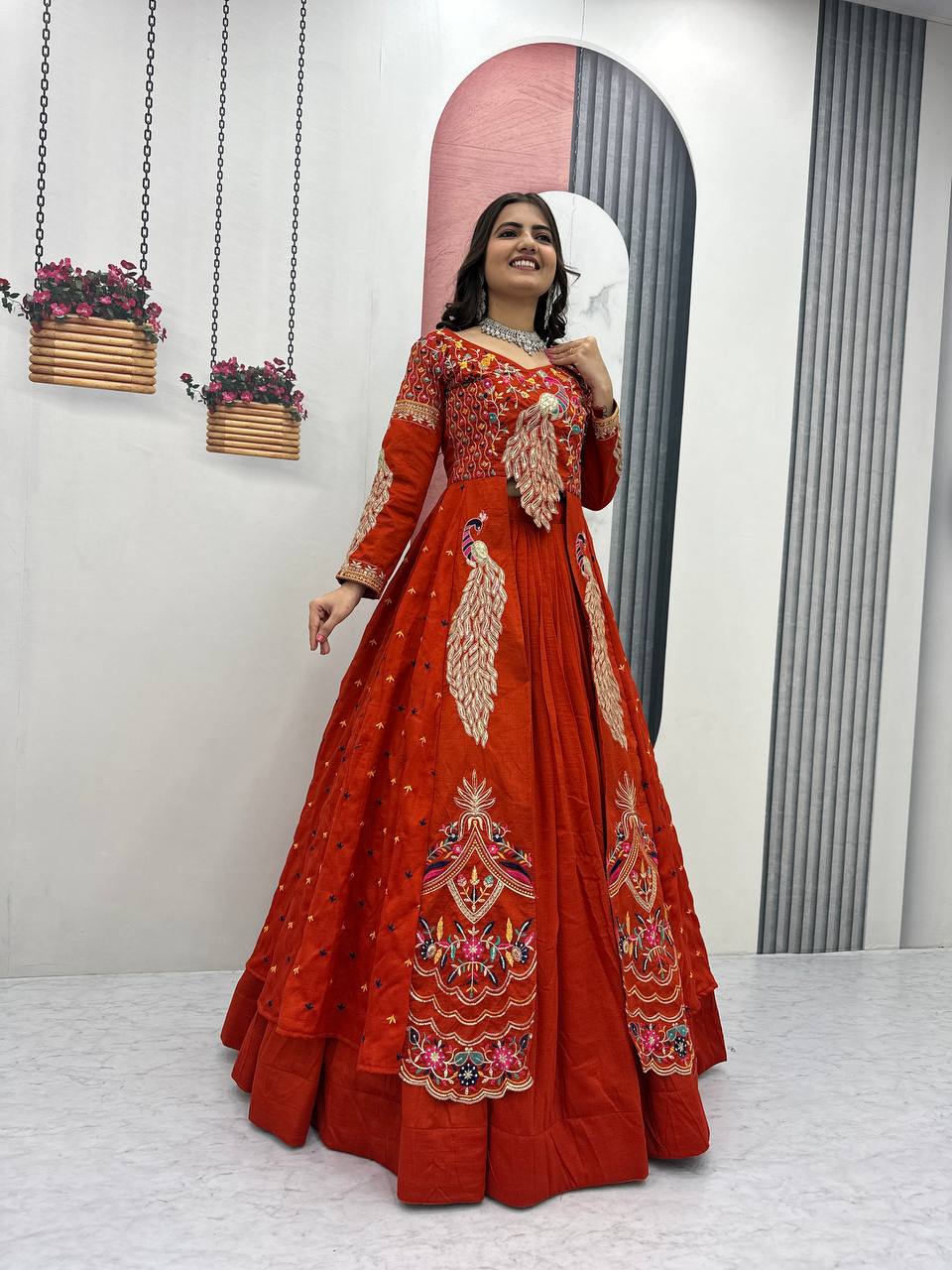 Mani orange Vichitra silk crop top peacock design lehenga with embroidered shrug