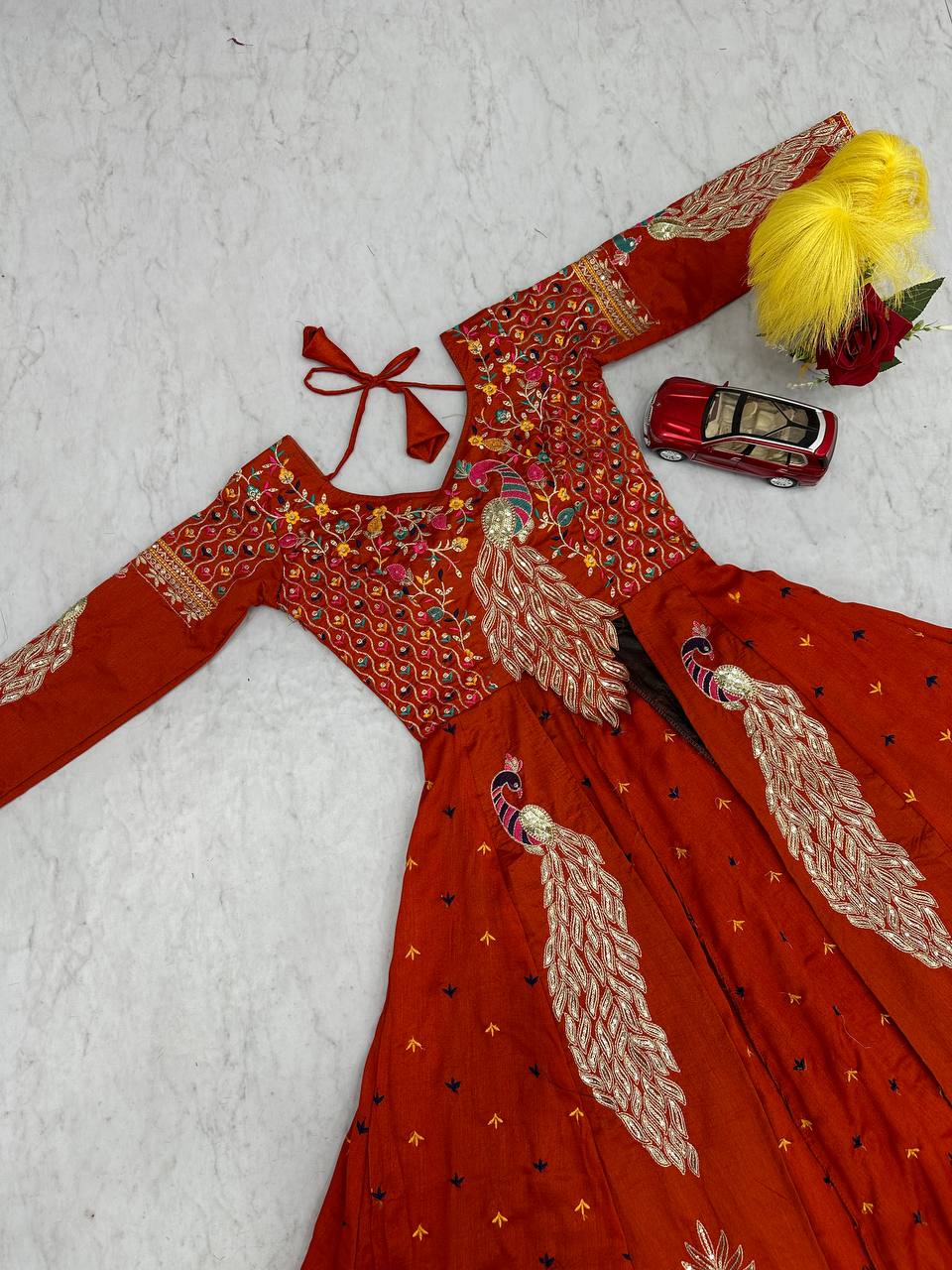 Mani orange Vichitra silk crop top peacock design lehenga with embroidered shrug