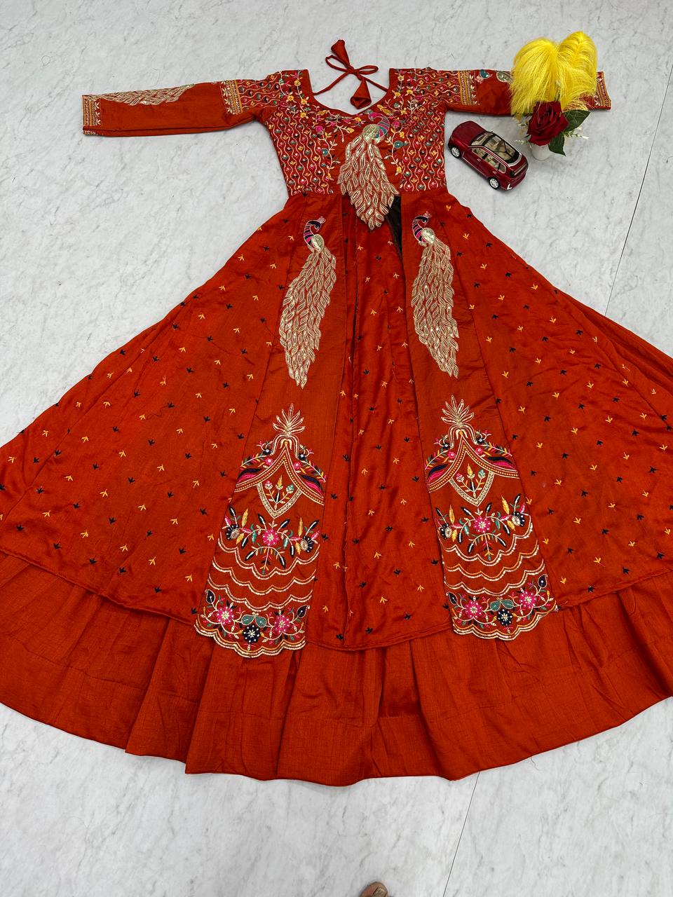 Mani orange Vichitra silk crop top peacock design lehenga with embroidered shrug