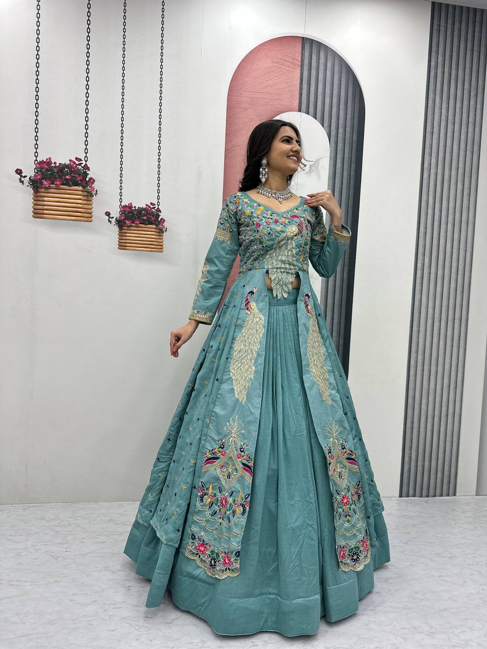 Mani teal Vichitra silk crop top peacock design lehenga with embroidered shrug
