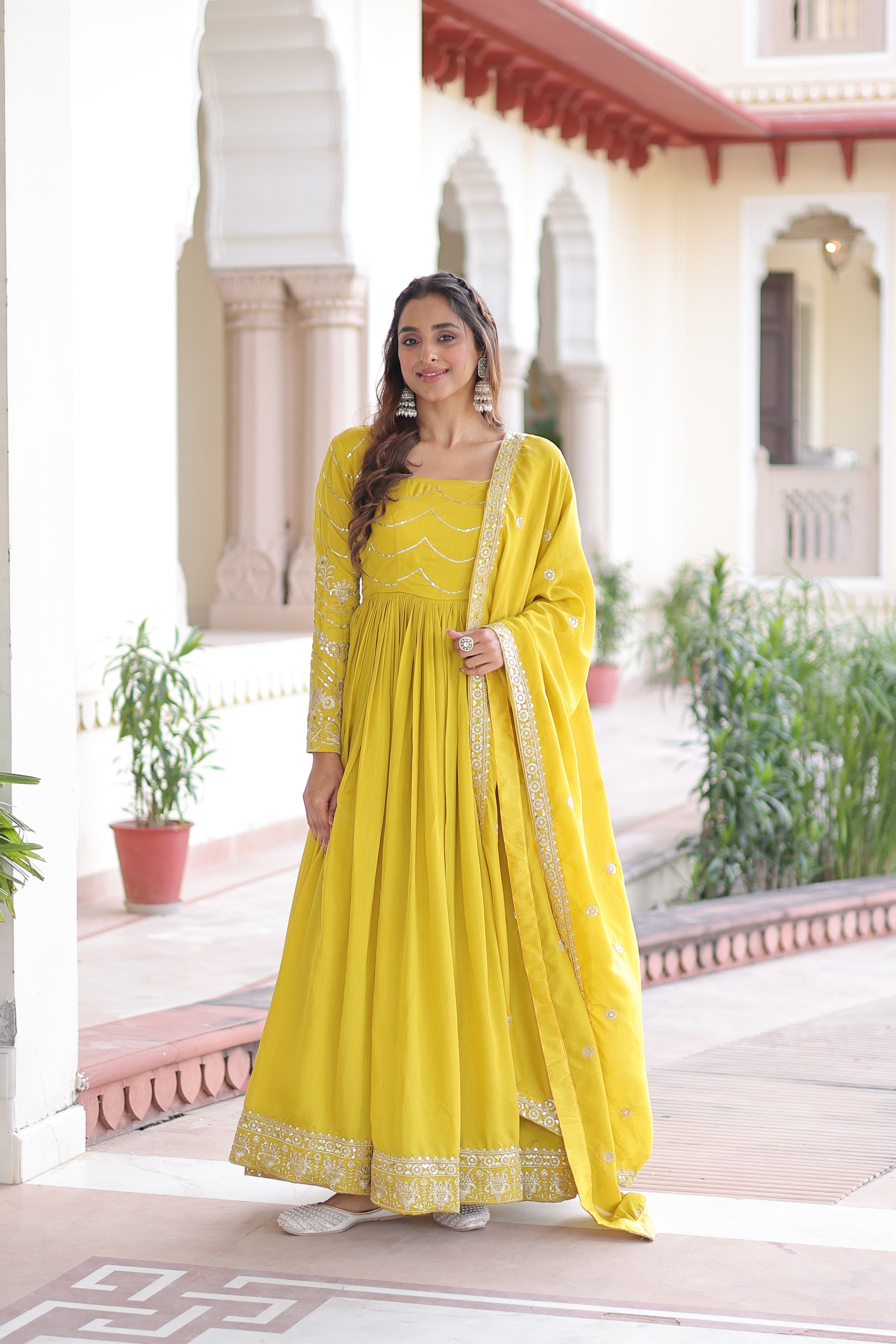 Yani yellow Vichitra silk gown with sequins embroidered work and dupatta