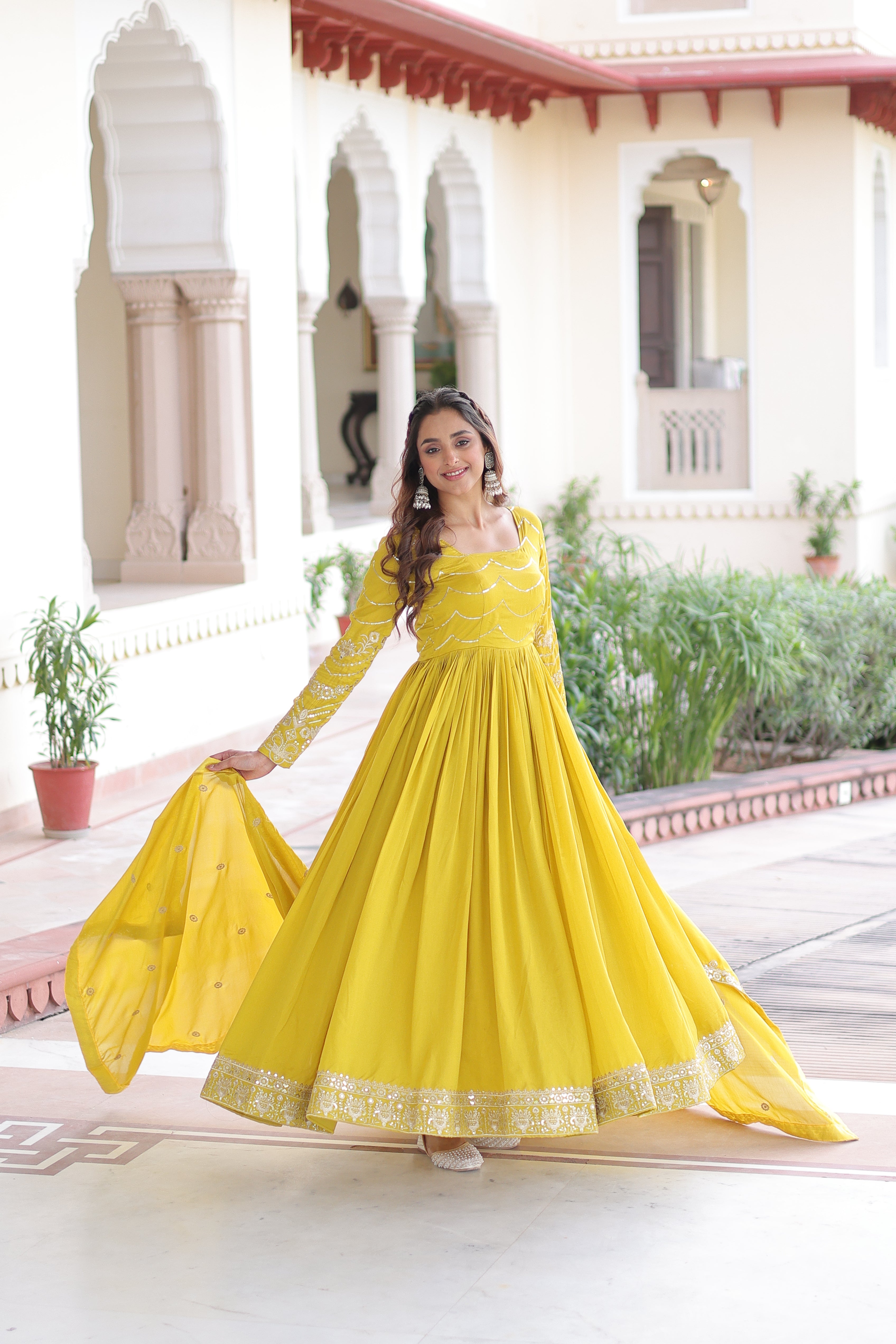 Yani yellow Vichitra silk gown with sequins embroidered work and dupatta