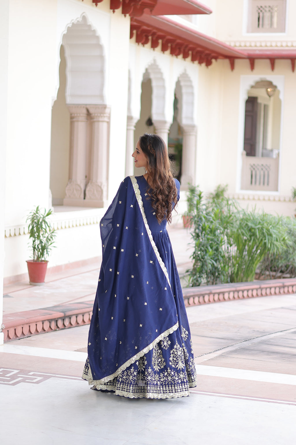 Tisara blue Vichitra silk gown with rich sequins embroidered work and dupatta