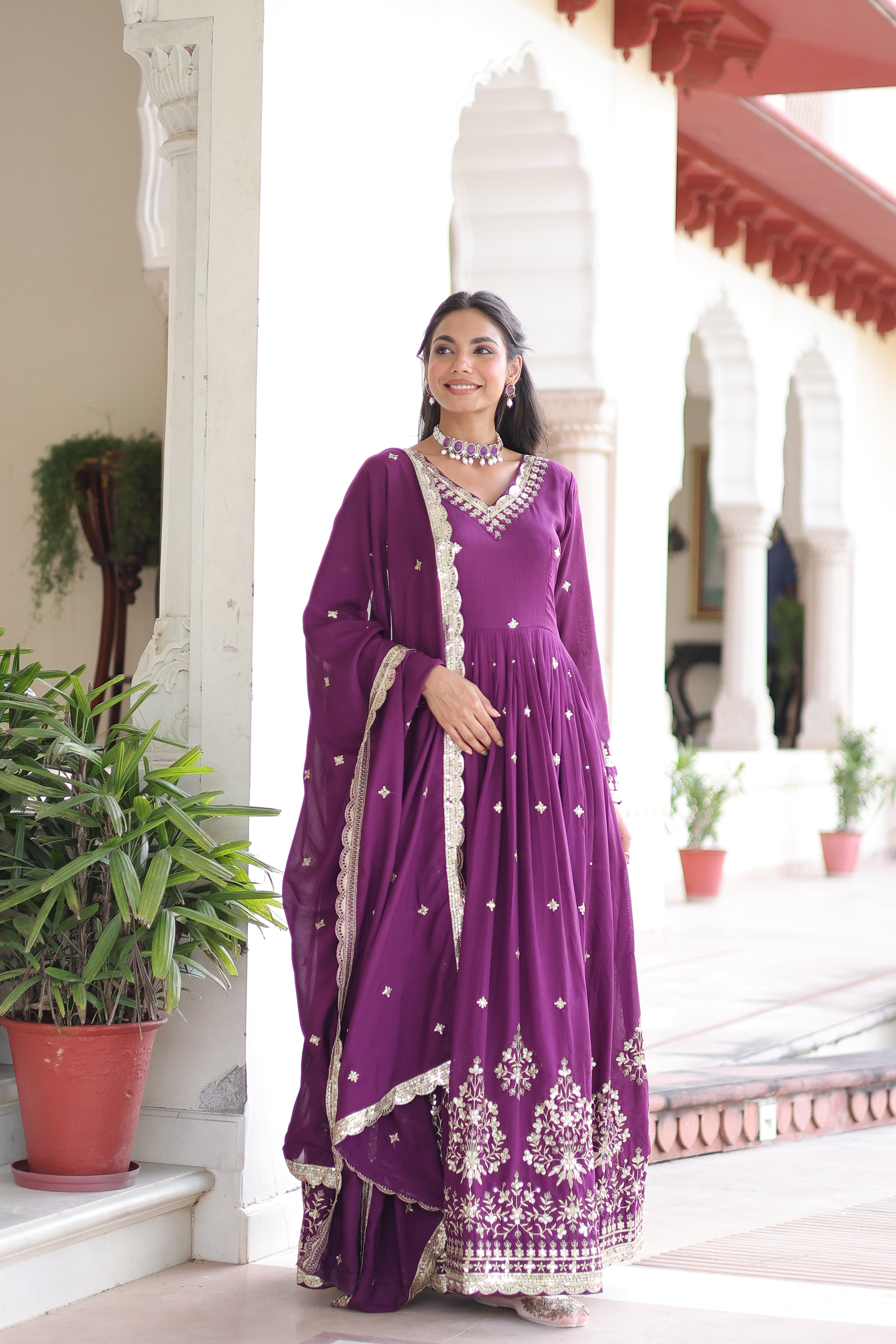 Tisara purple Vichitra silk gown with rich sequins embroidered work and dupatta