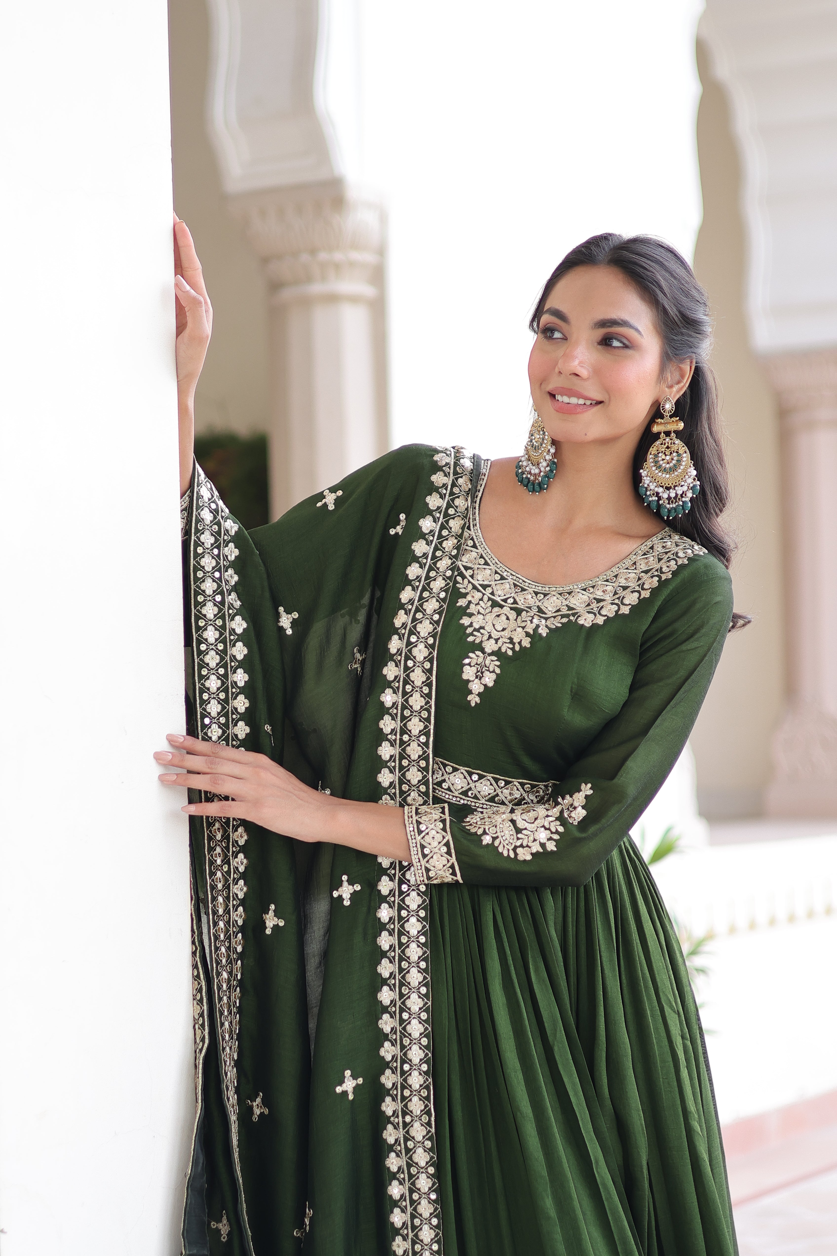 Ruvani green Vichitra silk gown with rich sequins embroidered work and dupatta