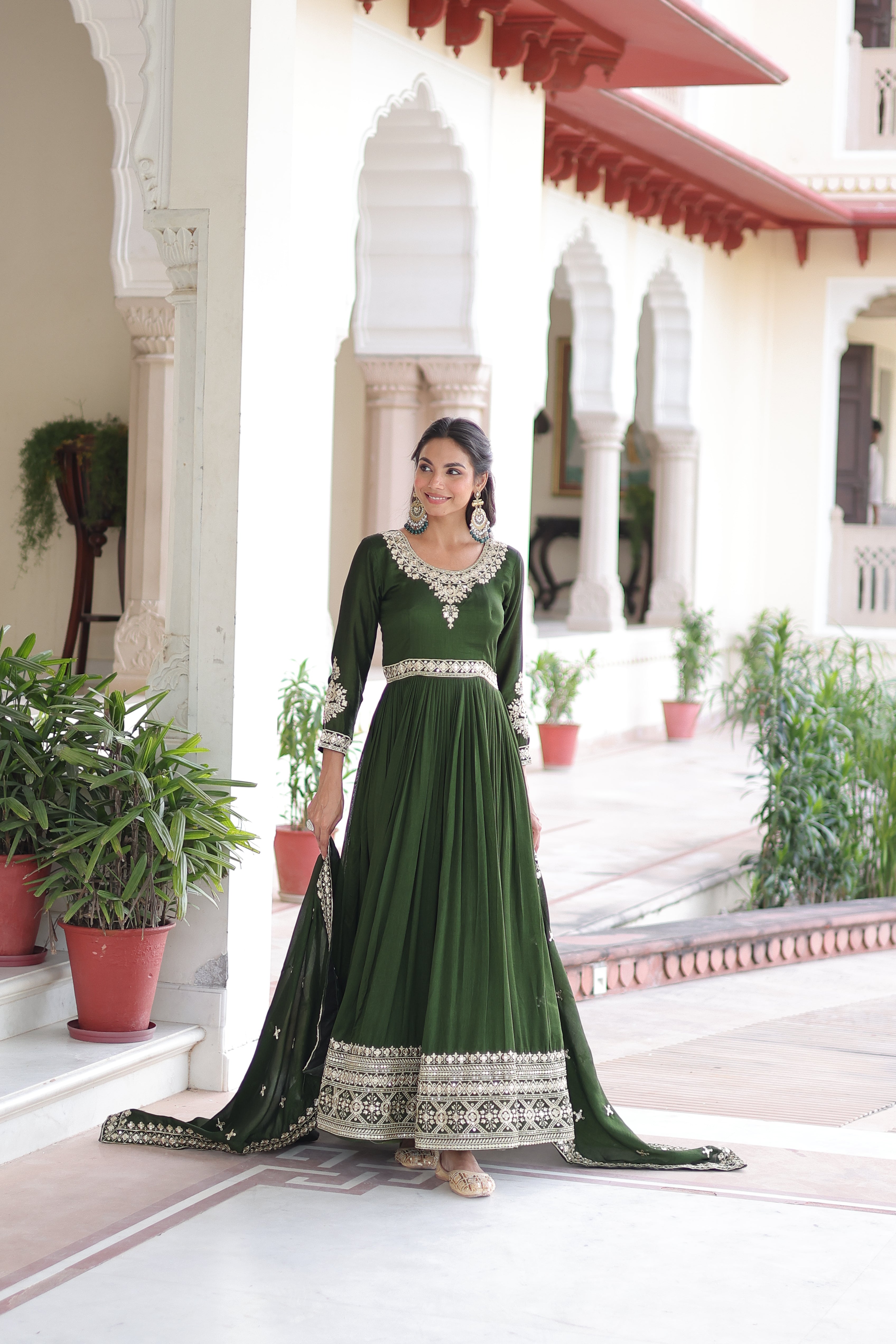 Ruvani green Vichitra silk gown with rich sequins embroidered work and dupatta