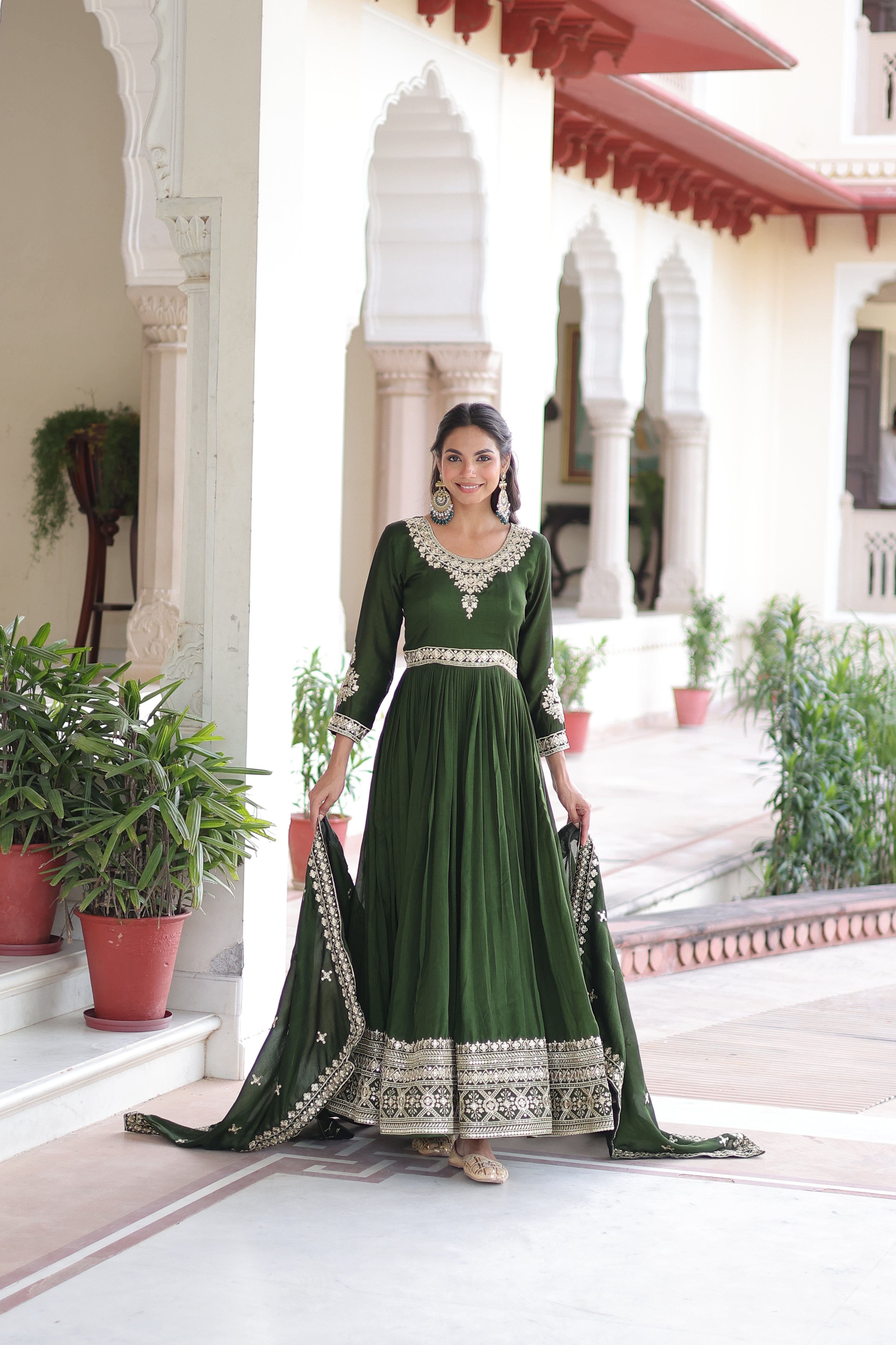 Ruvani green Vichitra silk gown with rich sequins embroidered work and dupatta