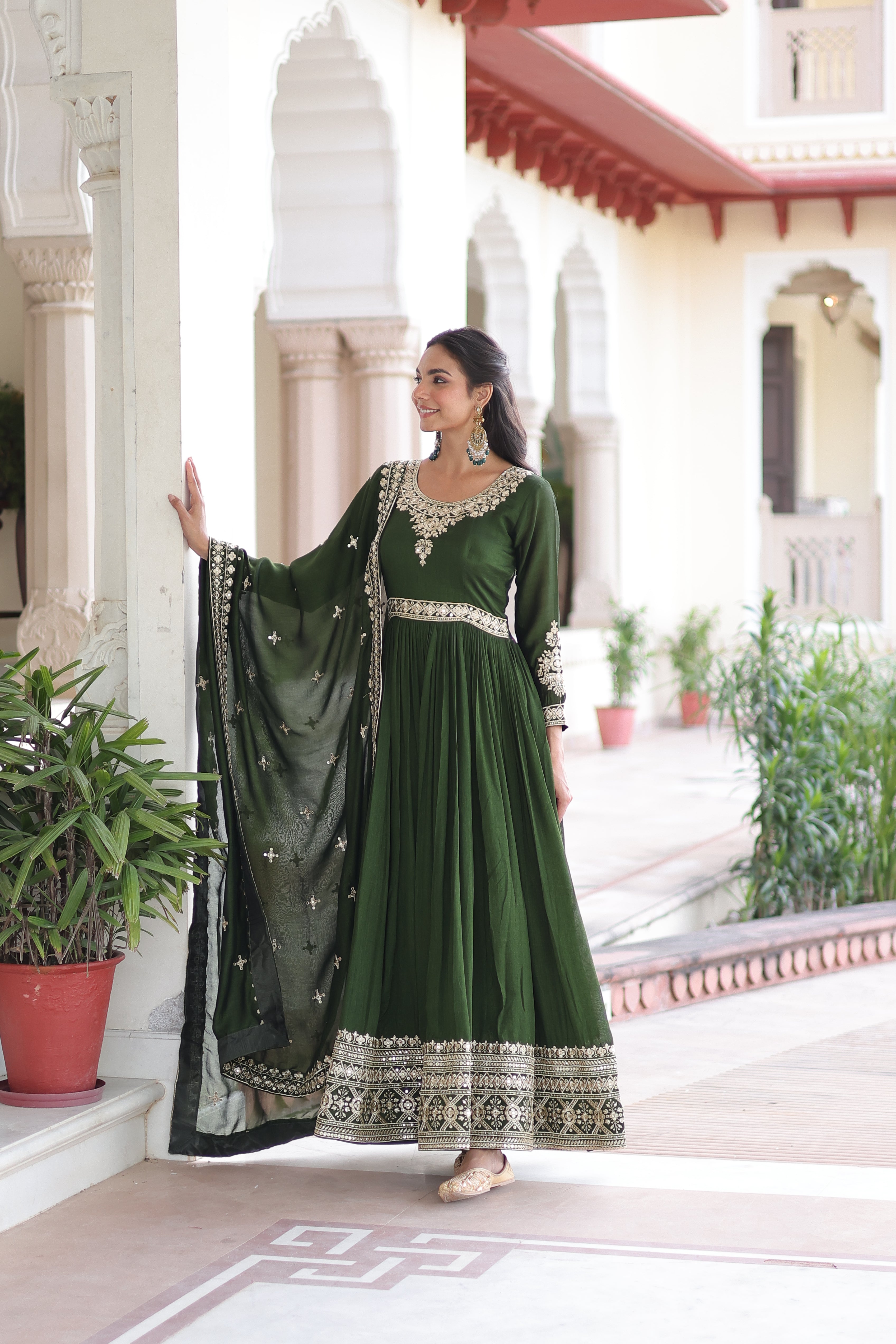 Ruvani green Vichitra silk gown with rich sequins embroidered work and dupatta