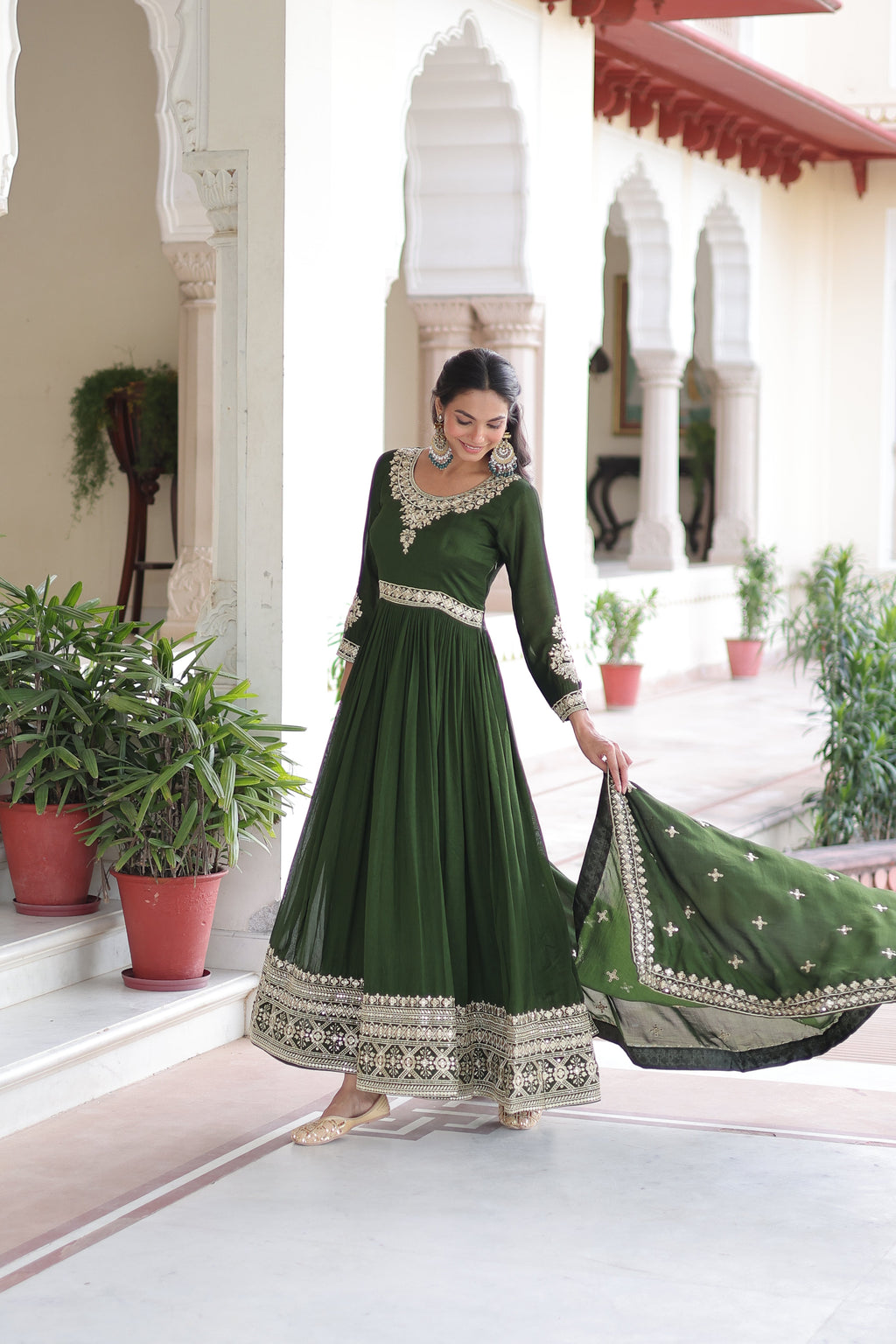 Ruvani green Vichitra silk gown with rich sequins embroidered work and dupatta