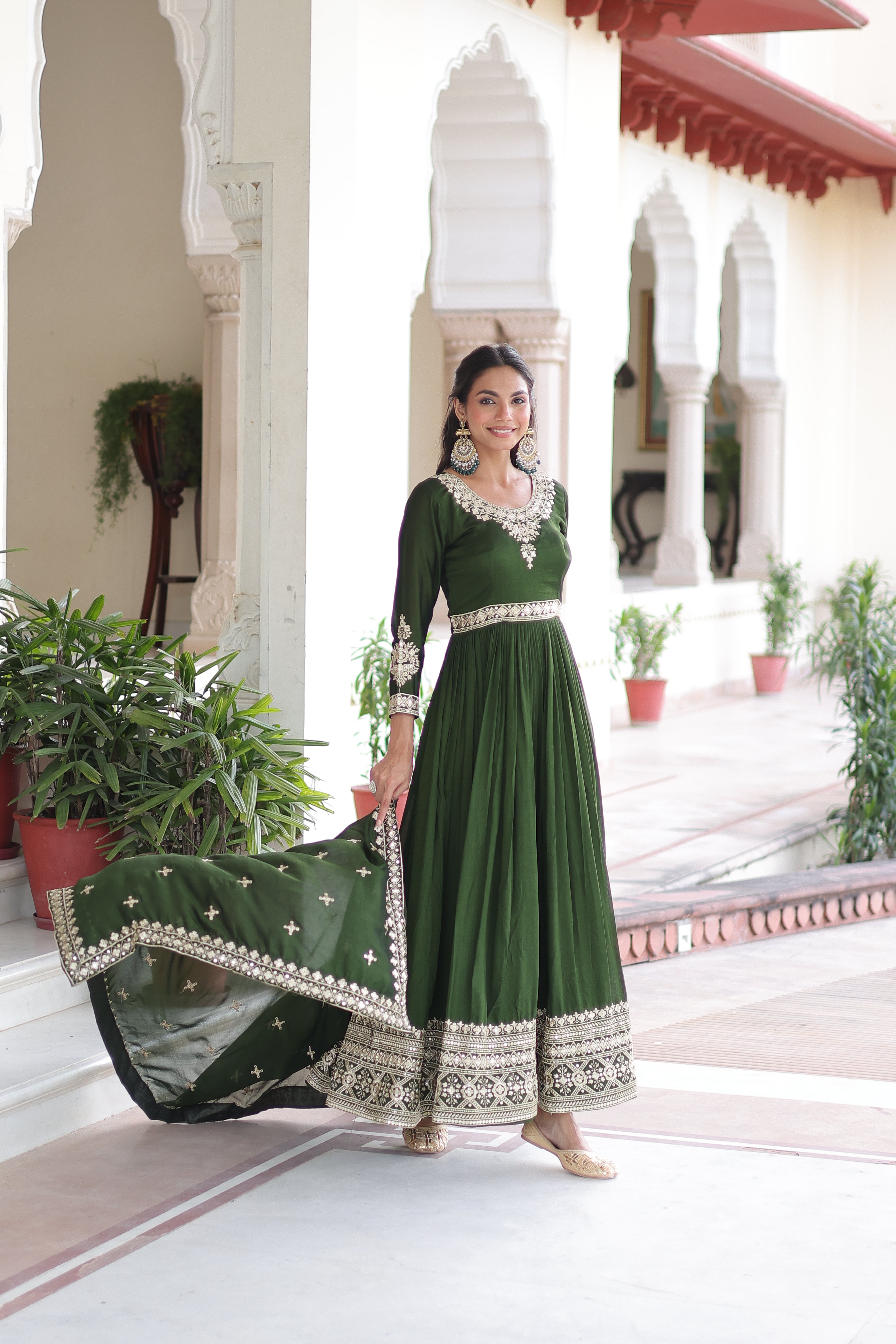 Ruvani green Vichitra silk gown with rich sequins embroidered work and dupatta