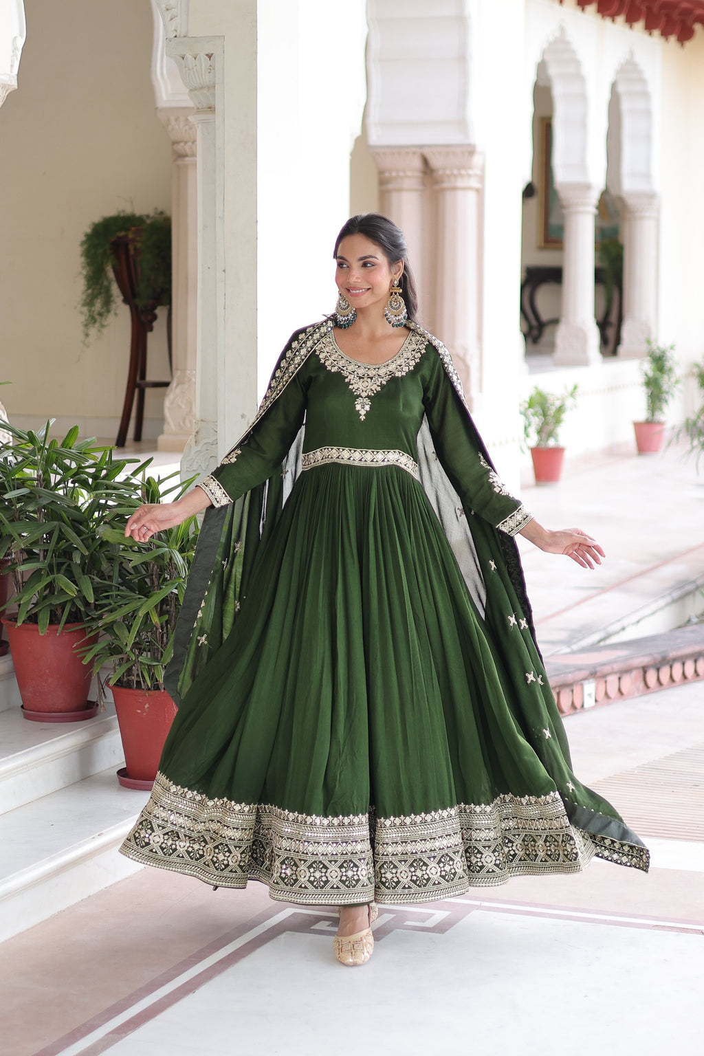 Ruvani green Vichitra silk gown with rich sequins embroidered work and dupatta