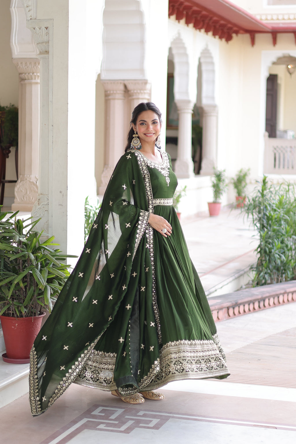 Ruvani green Vichitra silk gown with rich sequins embroidered work and dupatta