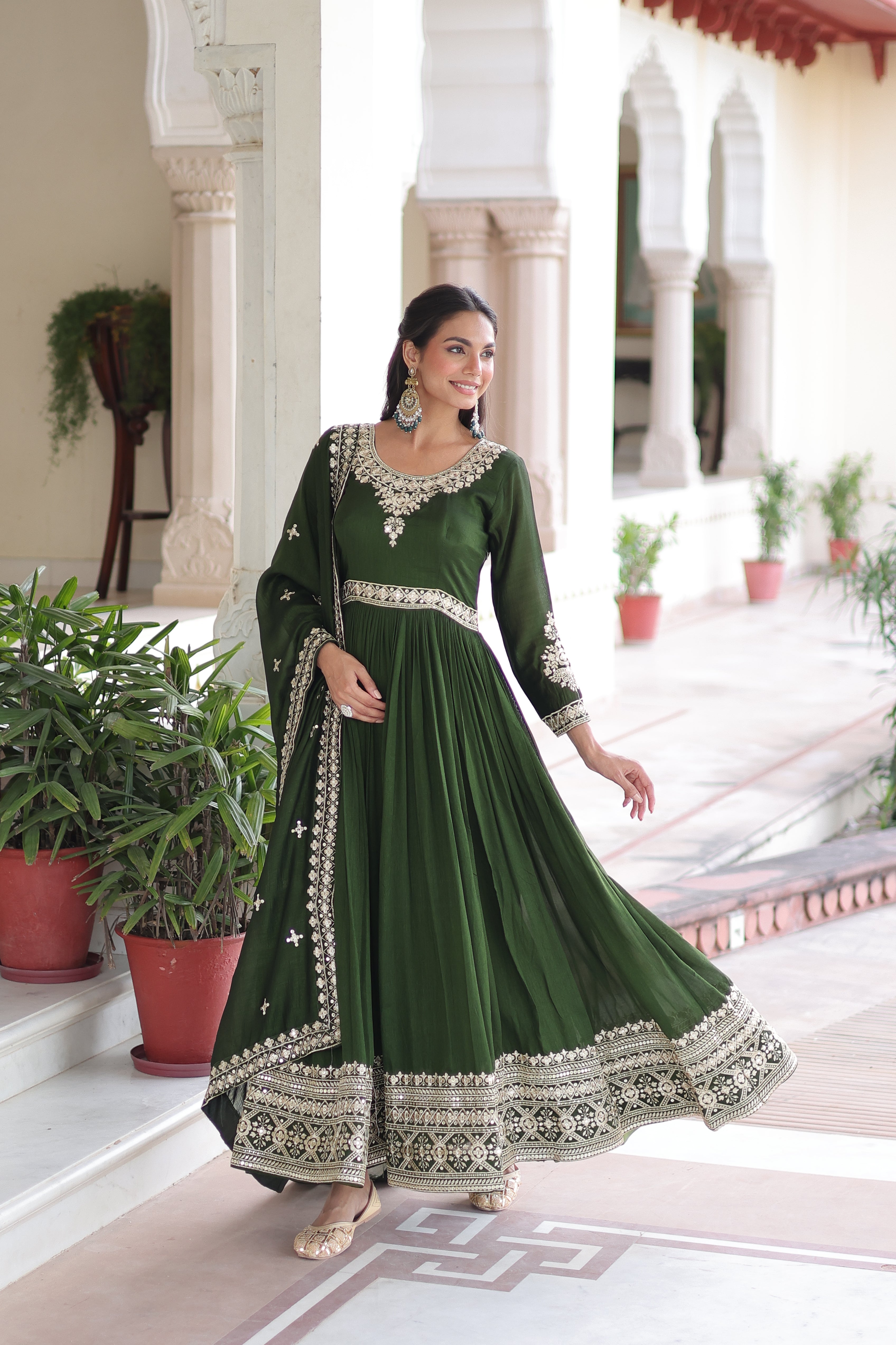 Ruvani green Vichitra silk gown with rich sequins embroidered work and dupatta