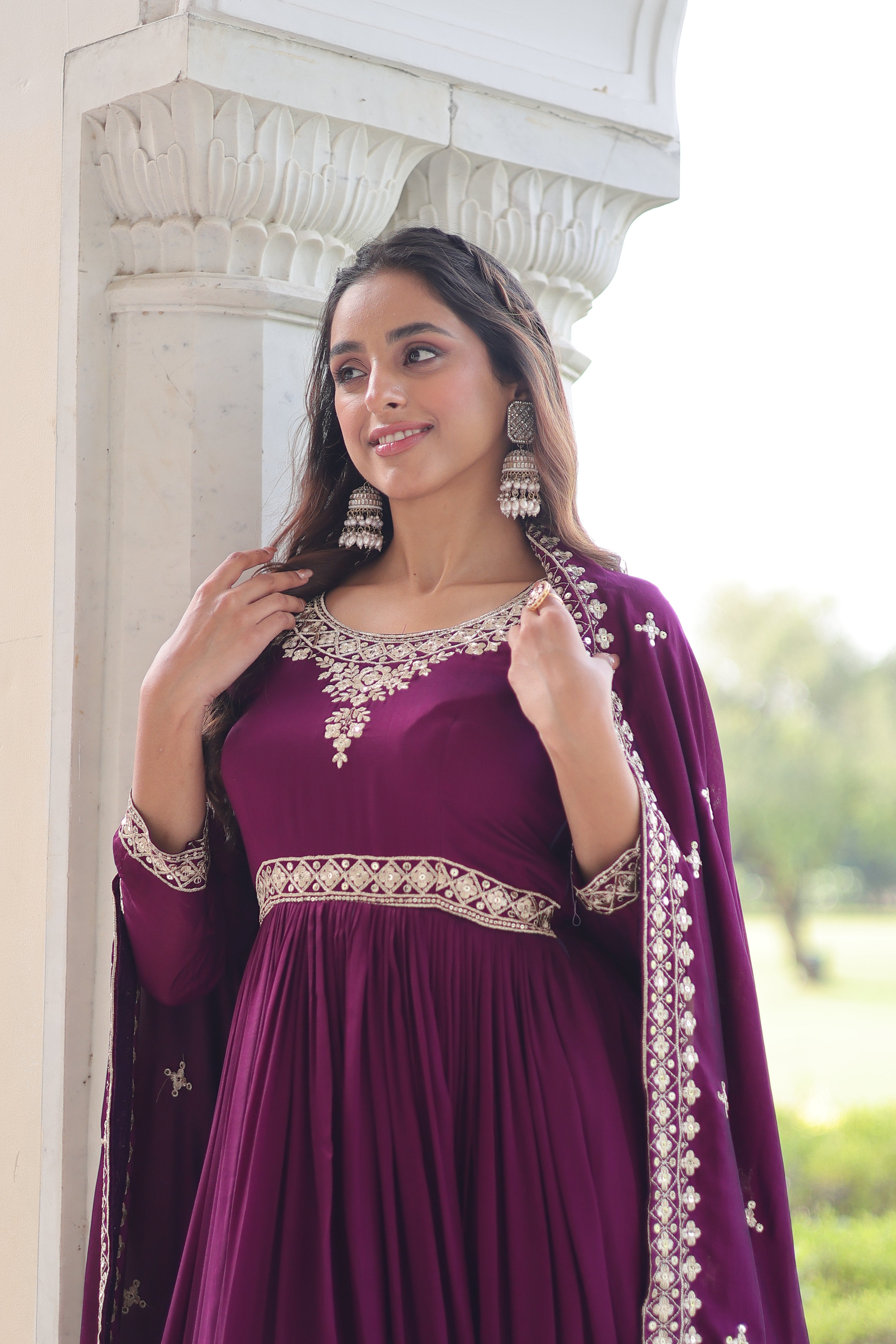 Ruvani wine Vichitra silk gown with rich sequins embroidered work and dupatta