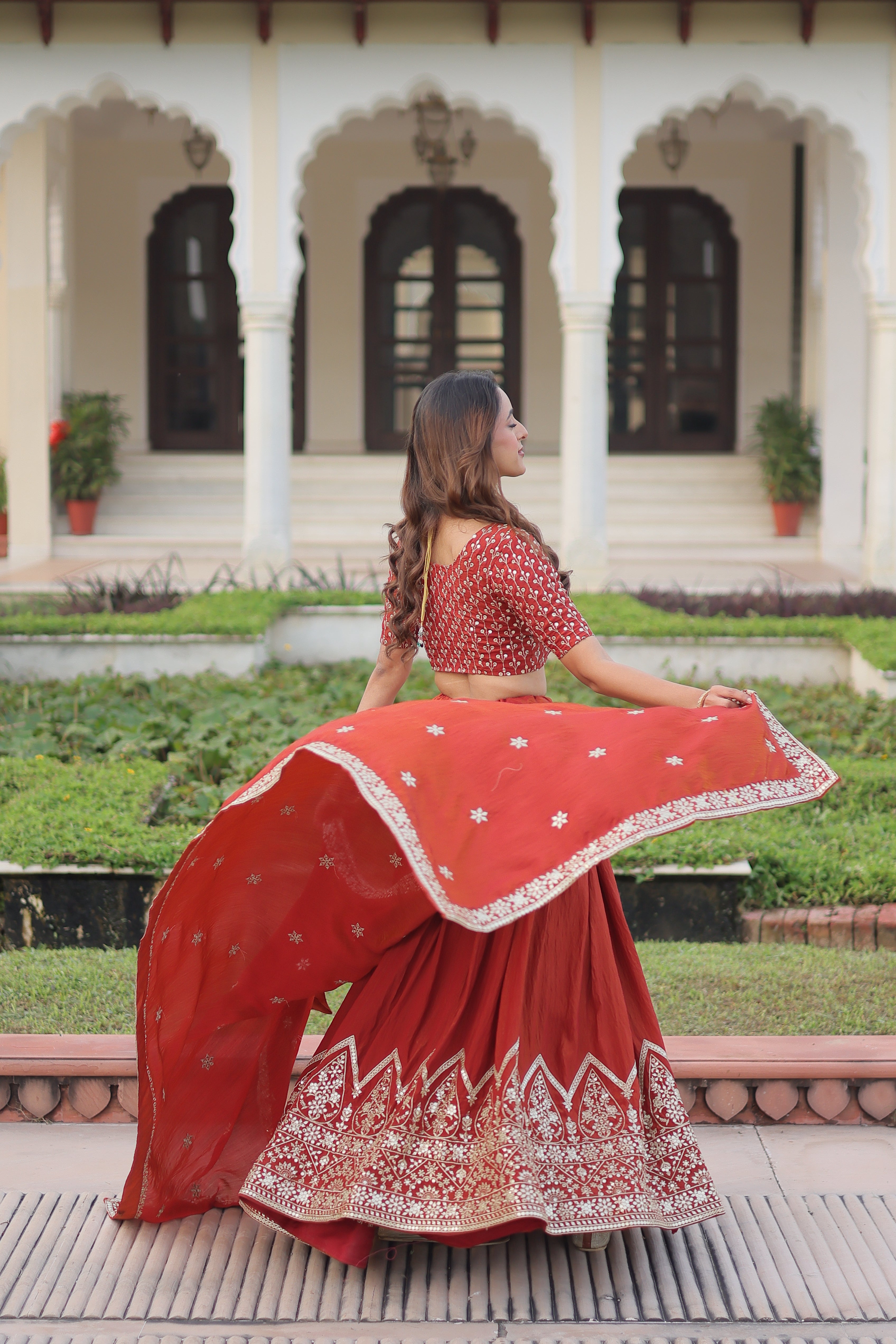 Omira orange Vichitra silk lehenga choli with sequins thread embroidery work