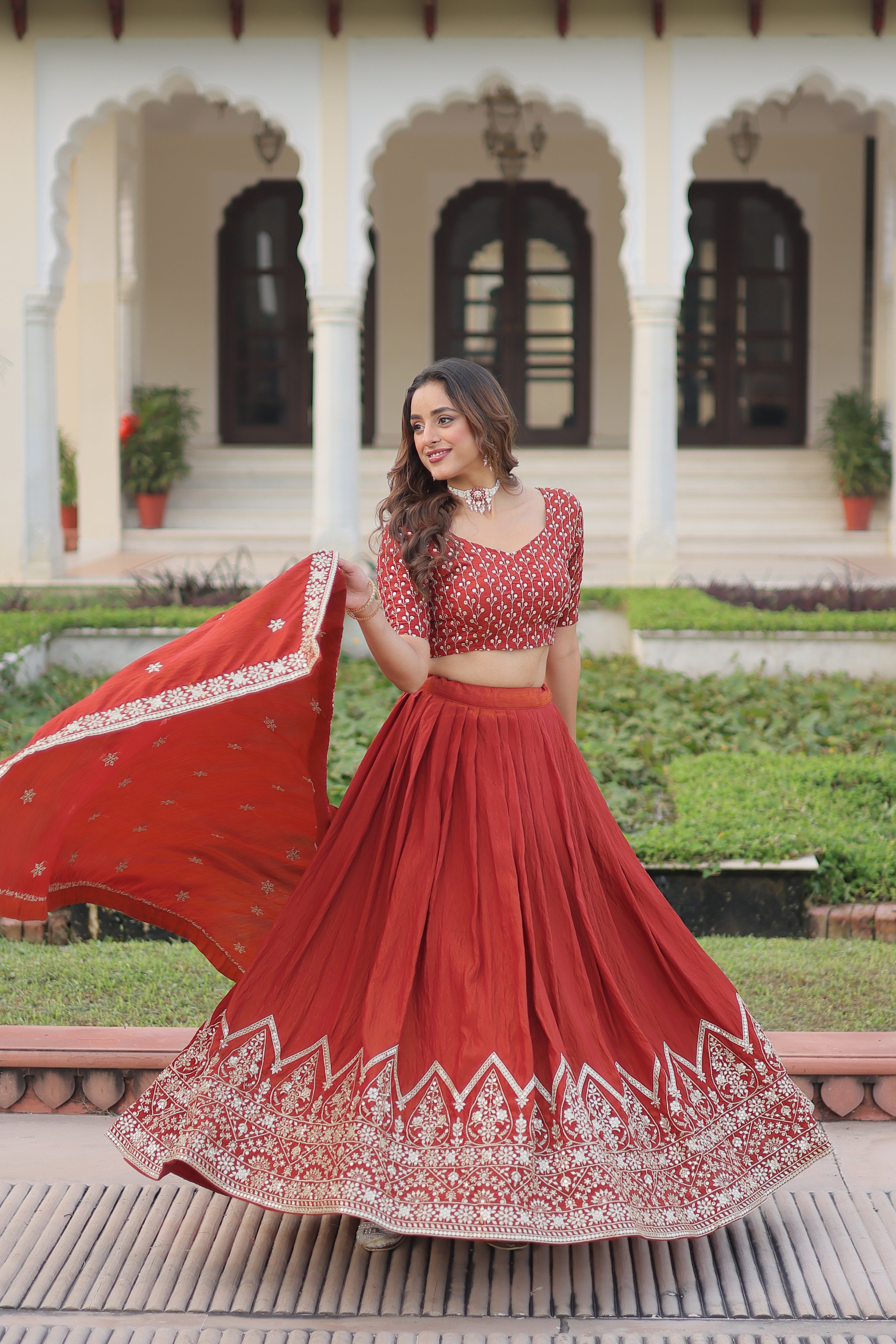 Omira orange Vichitra silk lehenga choli with sequins thread embroidery work