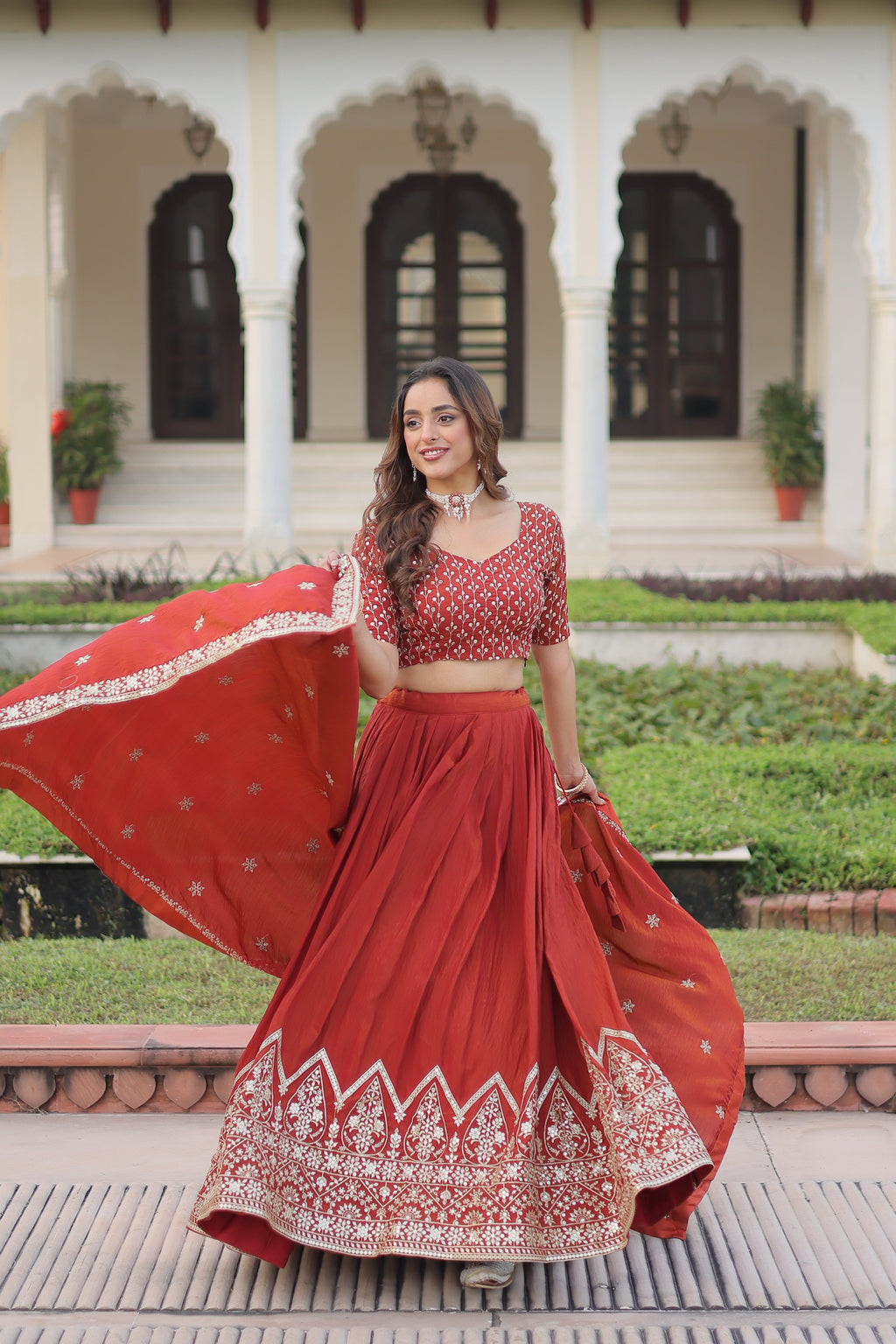Omira orange Vichitra silk lehenga choli with sequins thread embroidery work