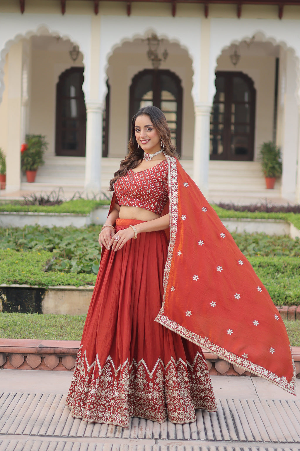 Omira orange Vichitra silk lehenga choli with sequins thread embroidery work