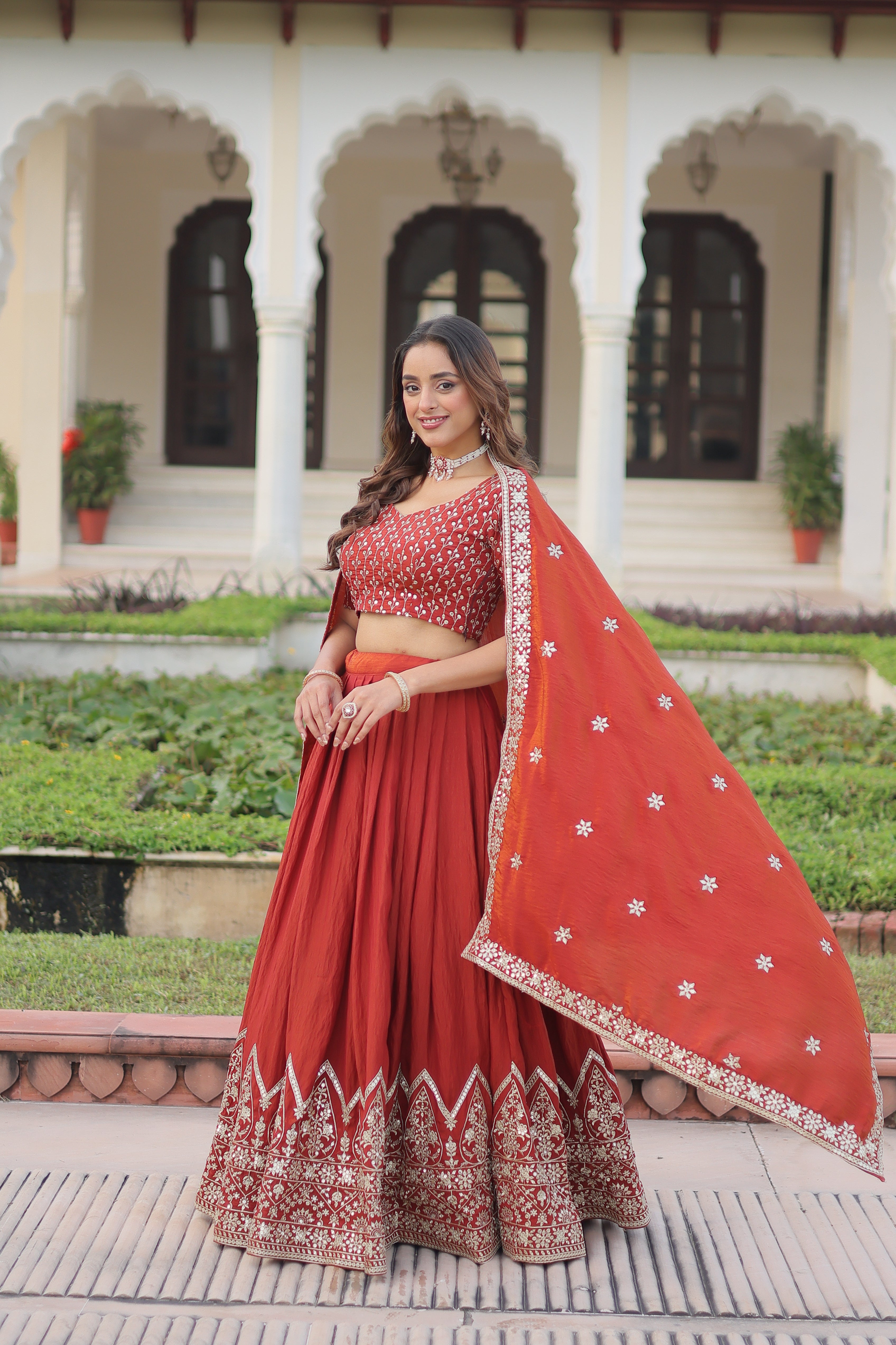 Omira orange Vichitra silk lehenga choli with sequins thread embroidery work
