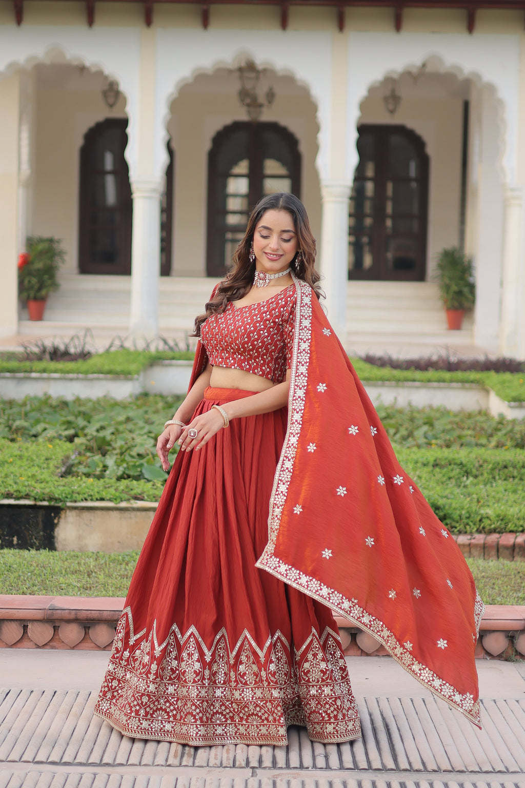 Omira orange Vichitra silk lehenga choli with sequins thread embroidery work