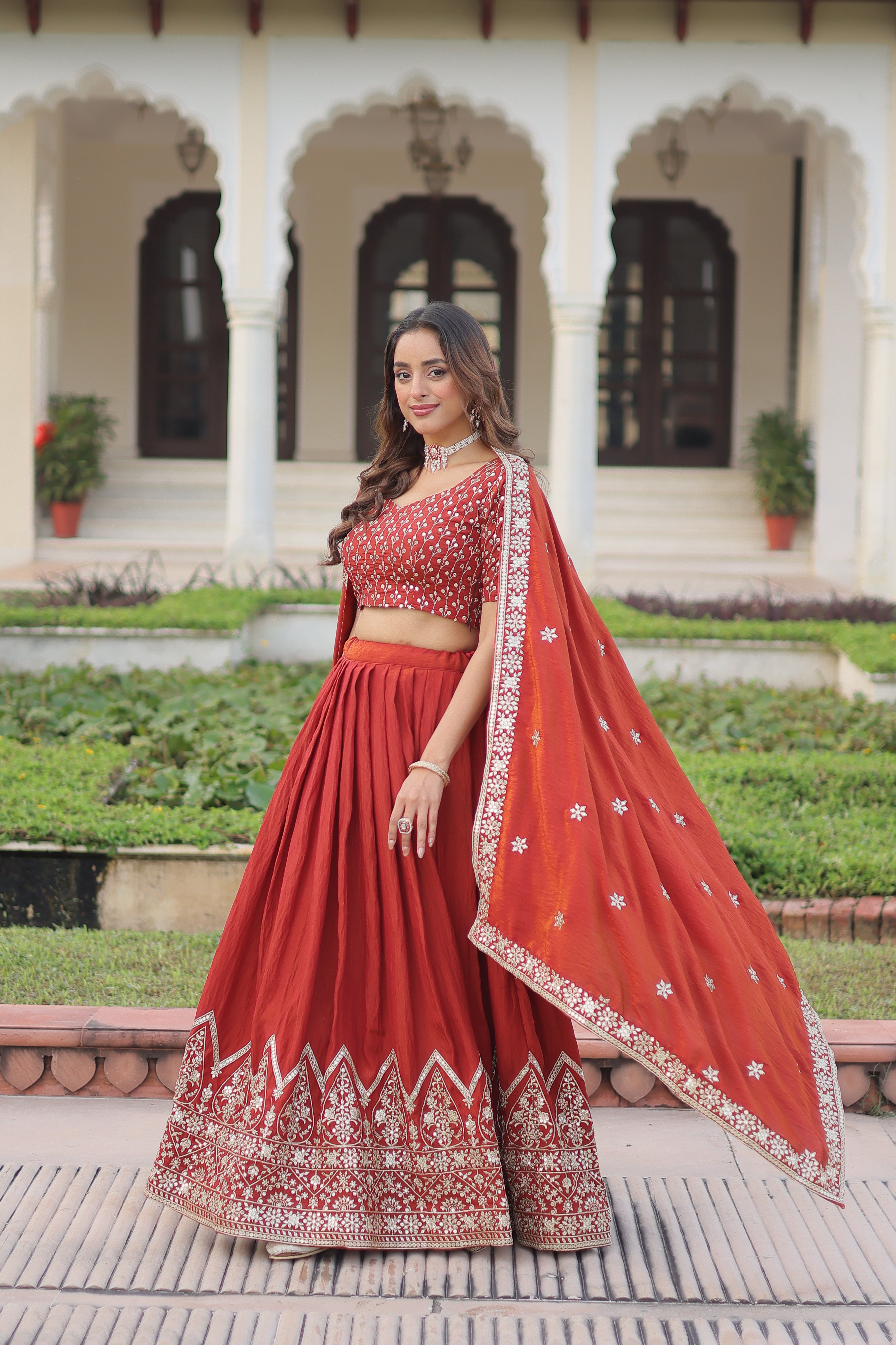Omira orange Vichitra silk lehenga choli with sequins thread embroidery work