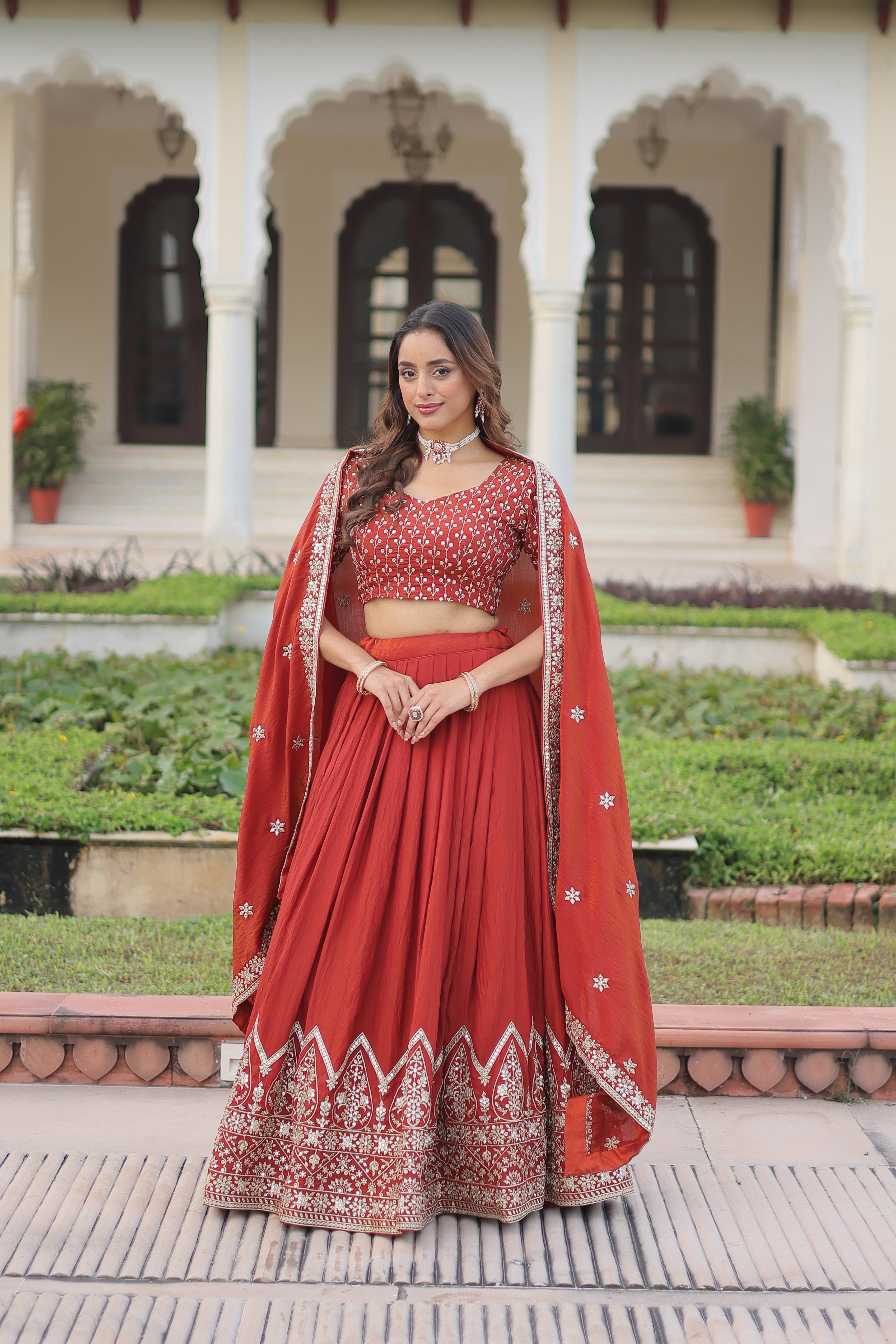Omira orange Vichitra silk lehenga choli with sequins thread embroidery work