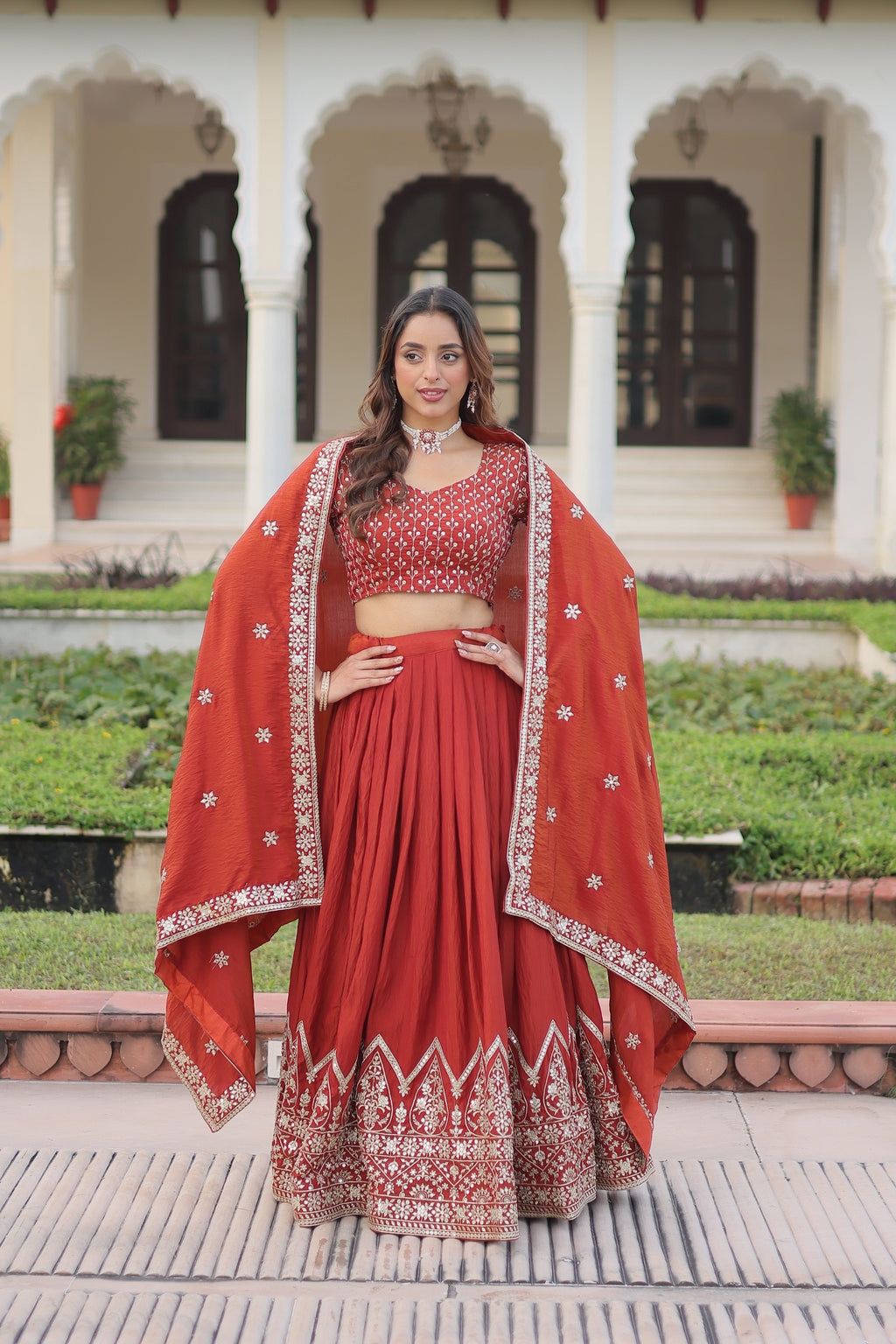 Omira orange Vichitra silk lehenga choli with sequins thread embroidery work