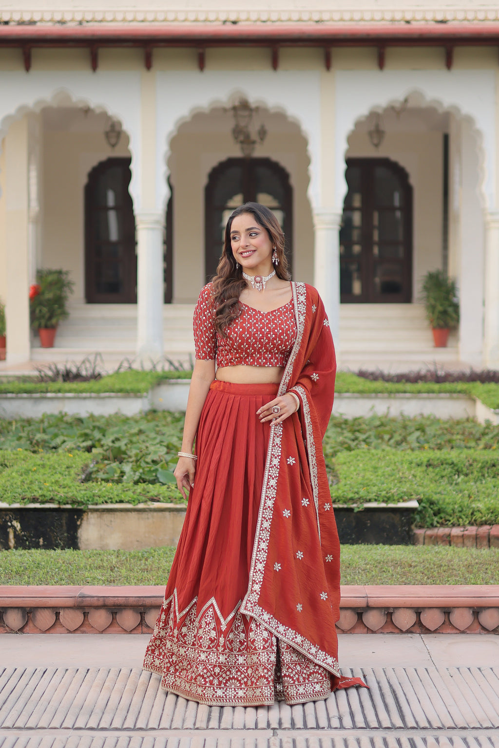 Omira orange Vichitra silk lehenga choli with sequins thread embroidery work