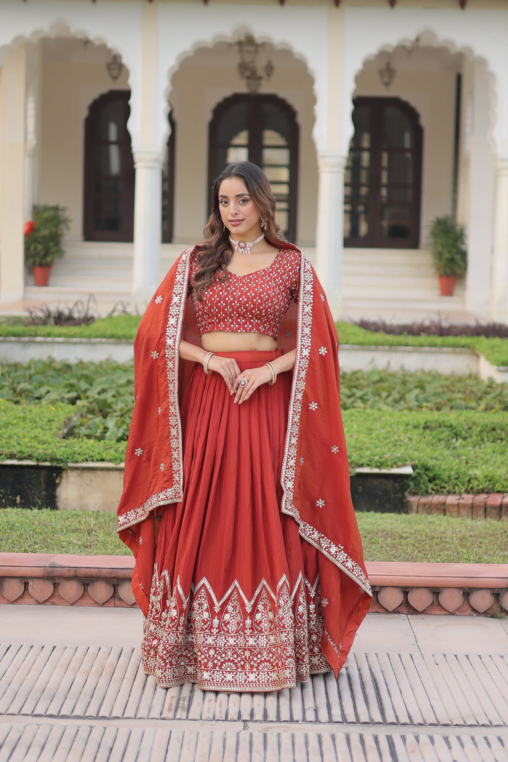 Omira orange Vichitra silk lehenga choli with sequins thread embroidery work