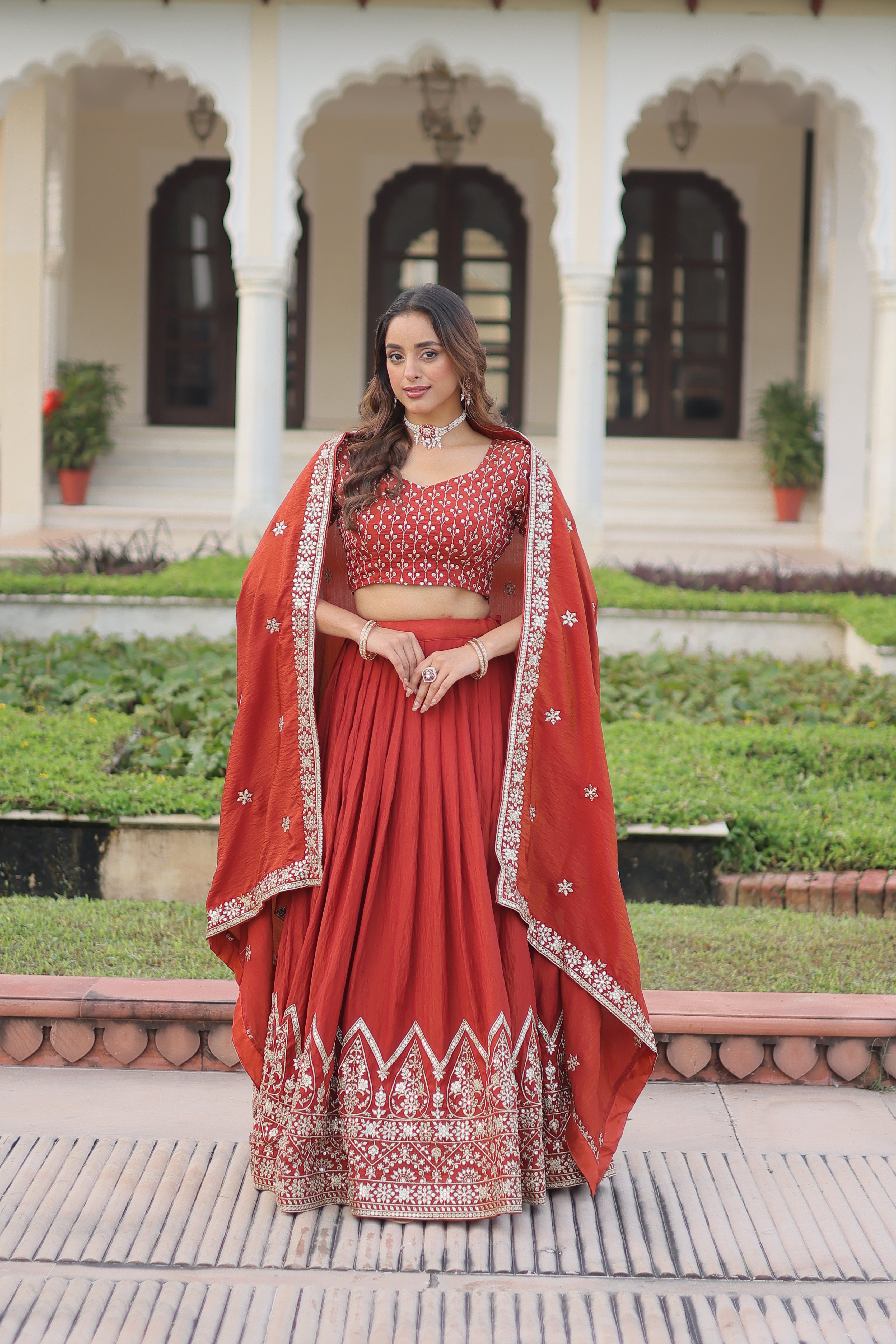 Omira orange Vichitra silk lehenga choli with sequins thread embroidery work
