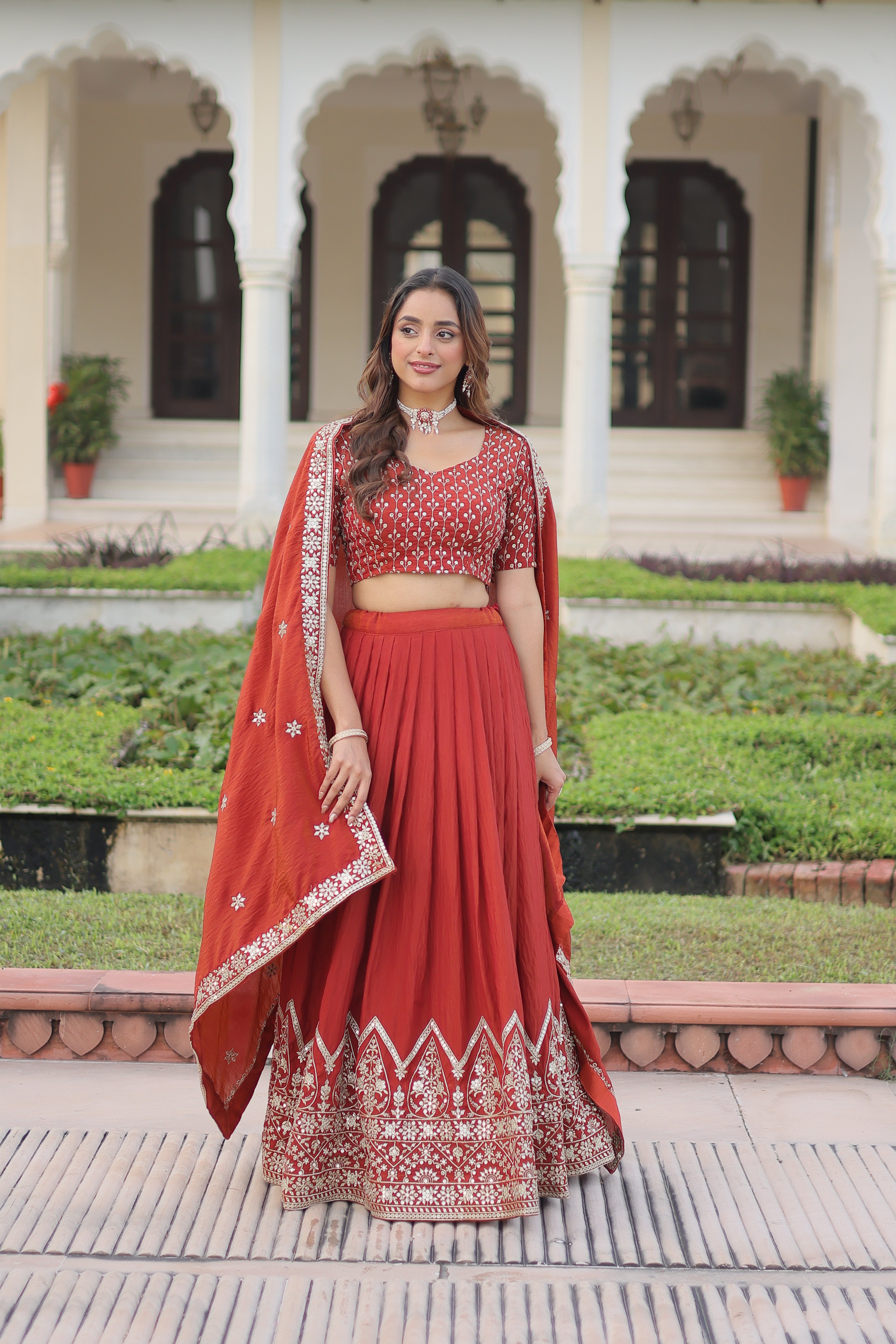 Omira orange Vichitra silk lehenga choli with sequins thread embroidery work
