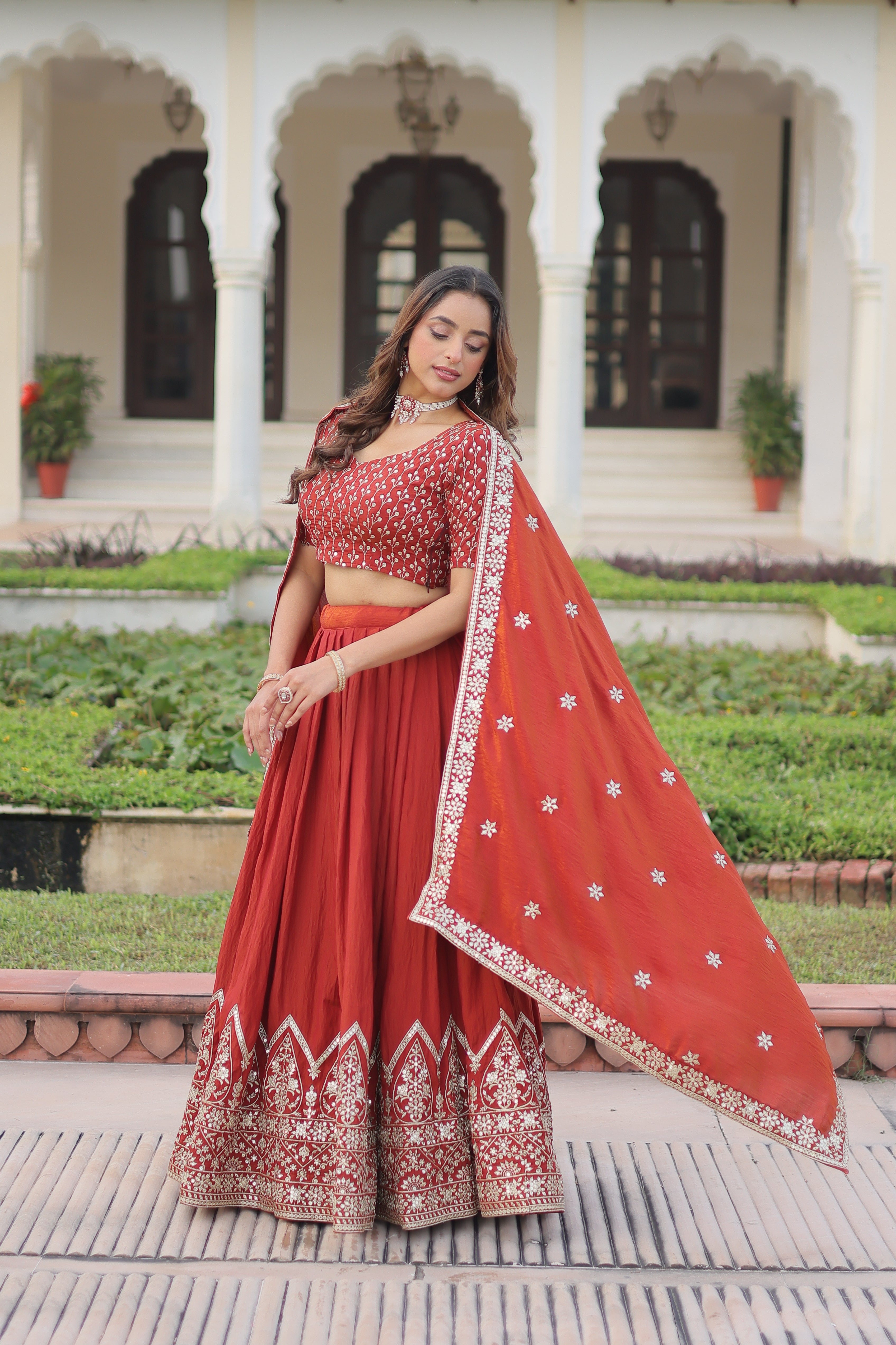 Omira orange Vichitra silk lehenga choli with sequins thread embroidery work