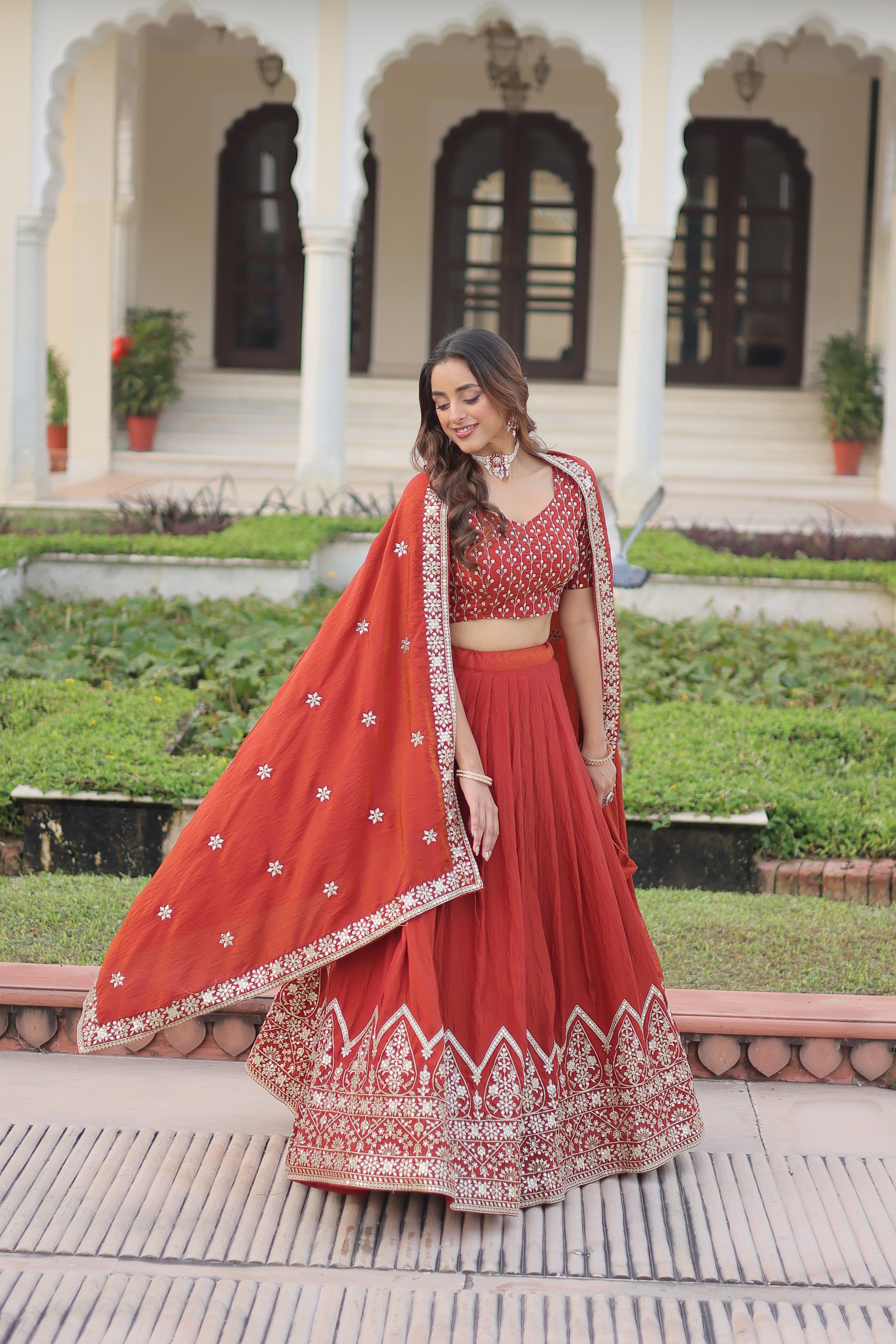Omira orange Vichitra silk lehenga choli with sequins thread embroidery work