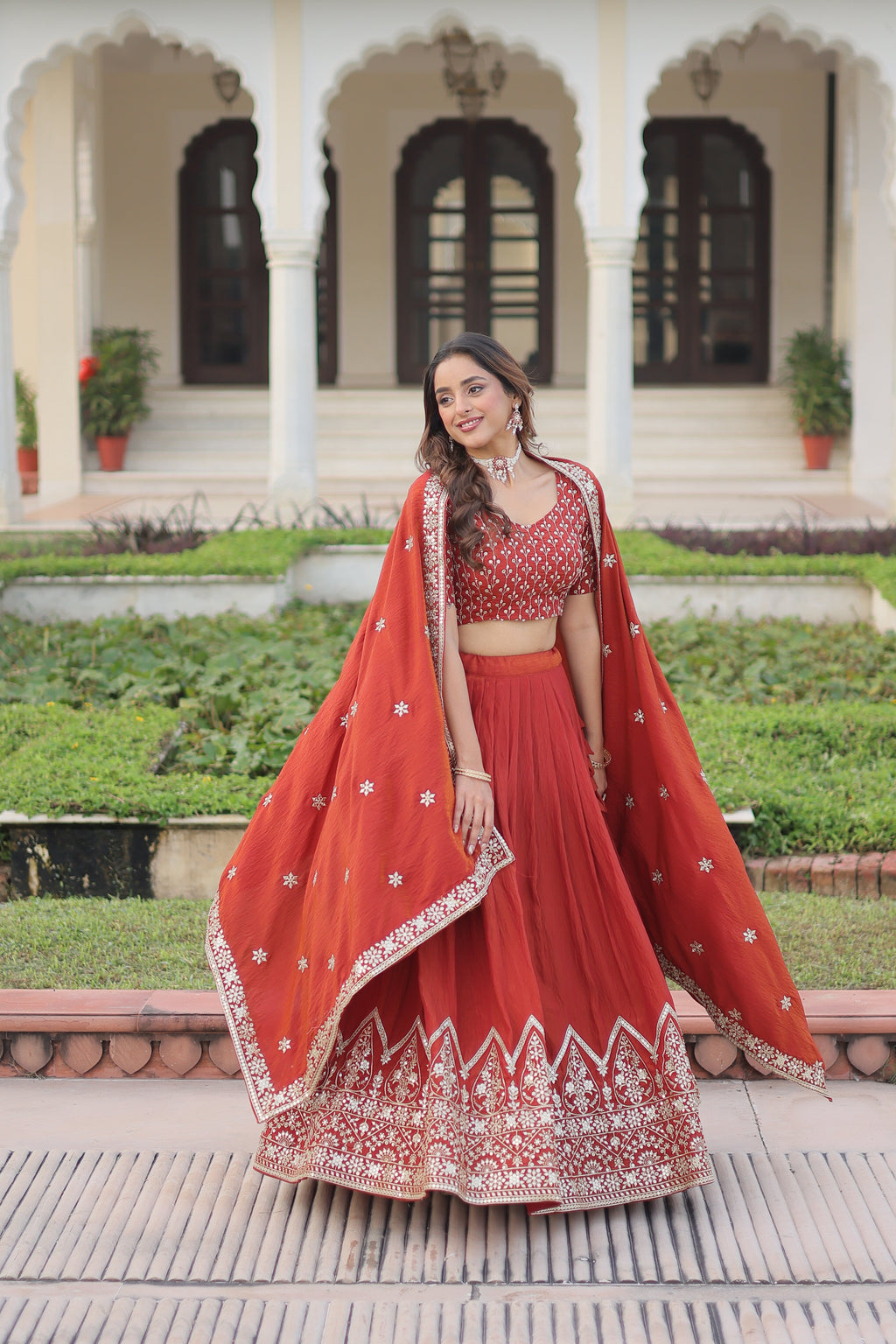 Omira orange Vichitra silk lehenga choli with sequins thread embroidery work