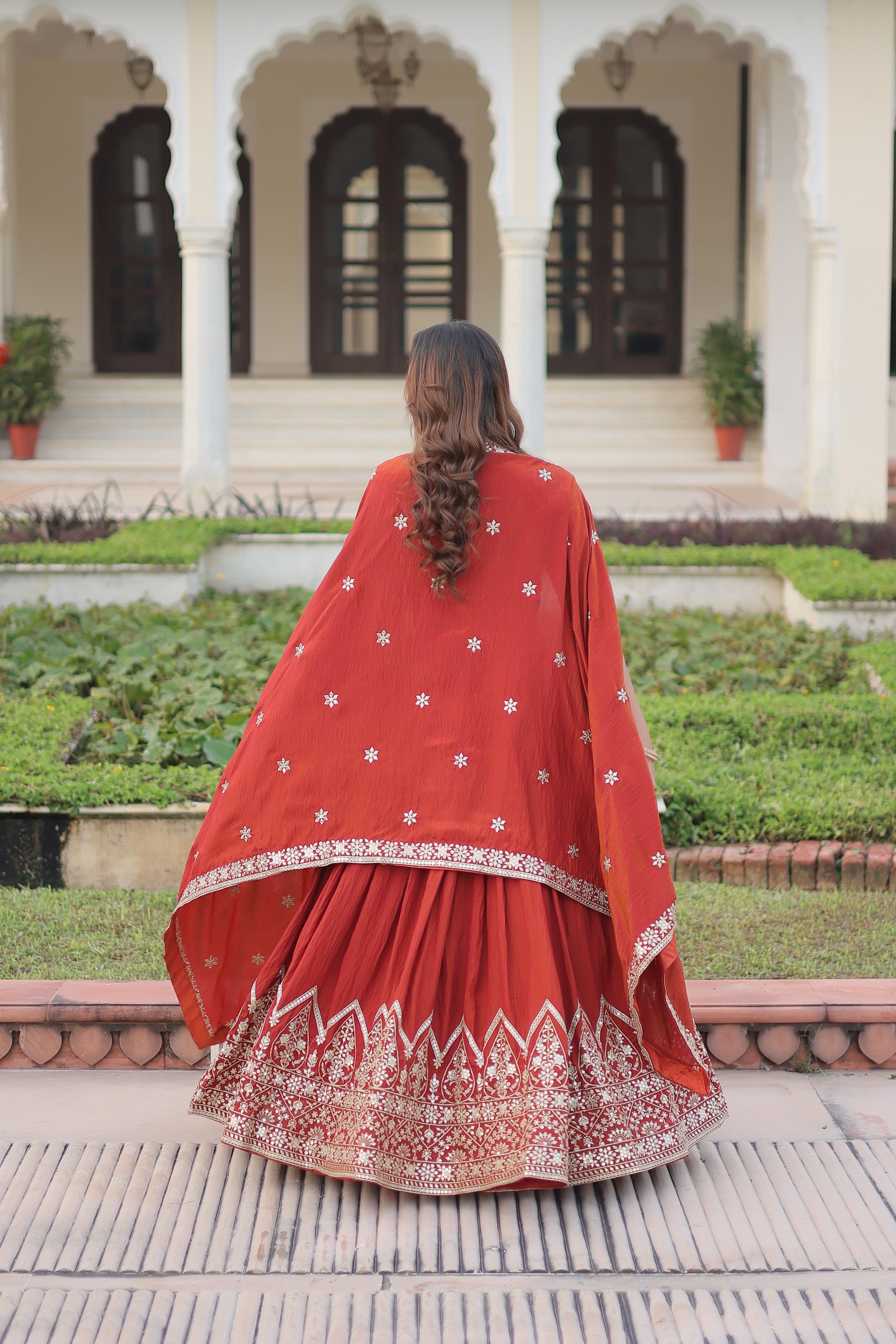 Omira orange Vichitra silk lehenga choli with sequins thread embroidery work