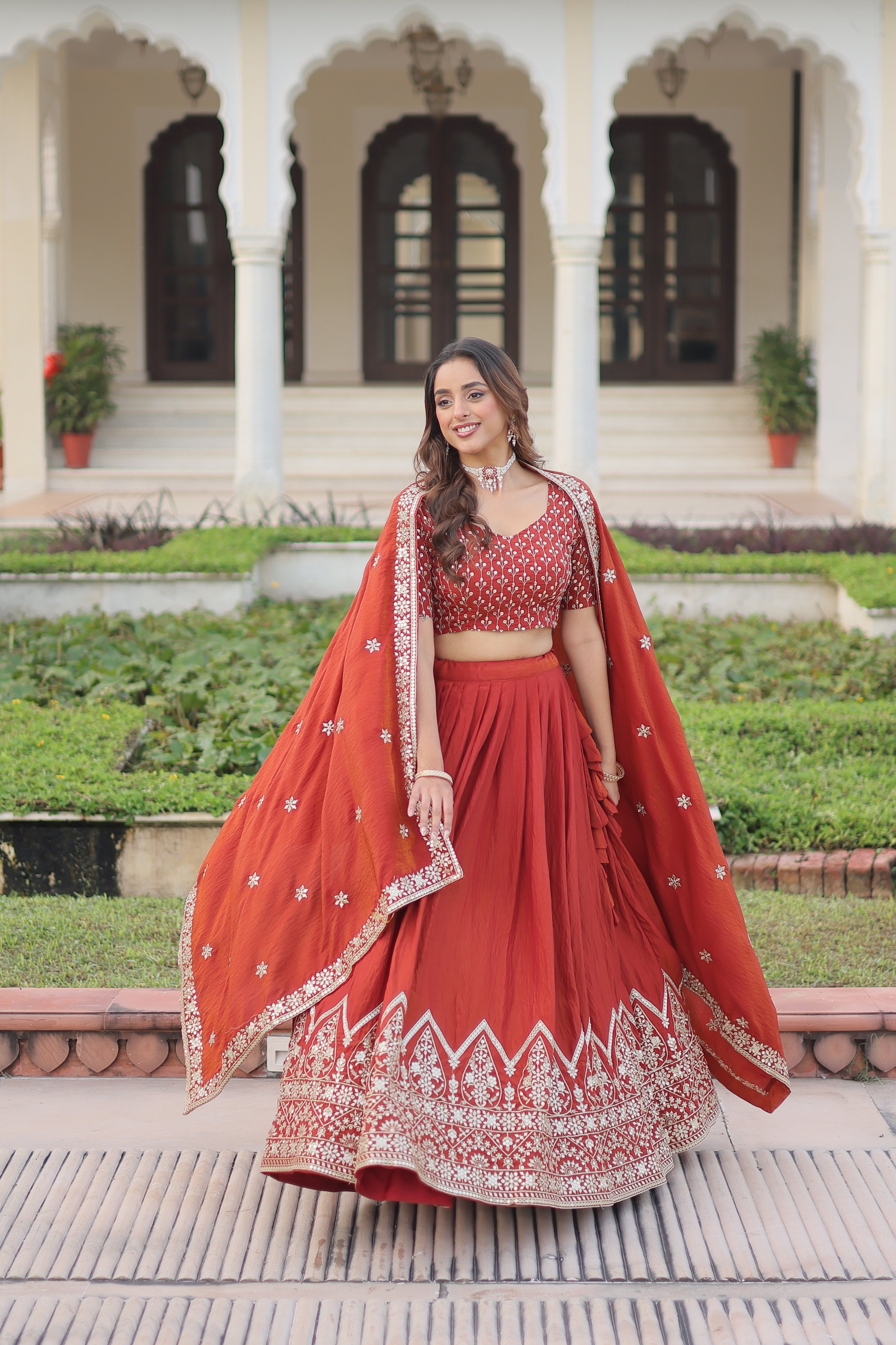 Omira orange Vichitra silk lehenga choli with sequins thread embroidery work