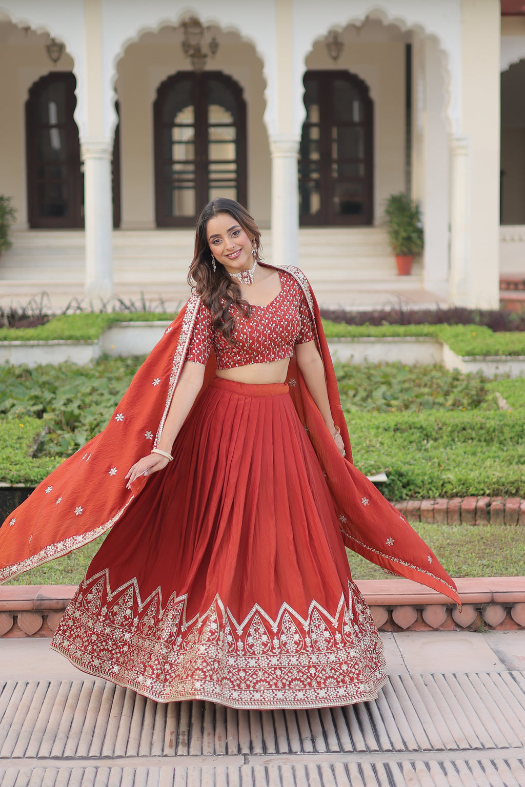 Omira orange Vichitra silk lehenga choli with sequins thread embroidery work