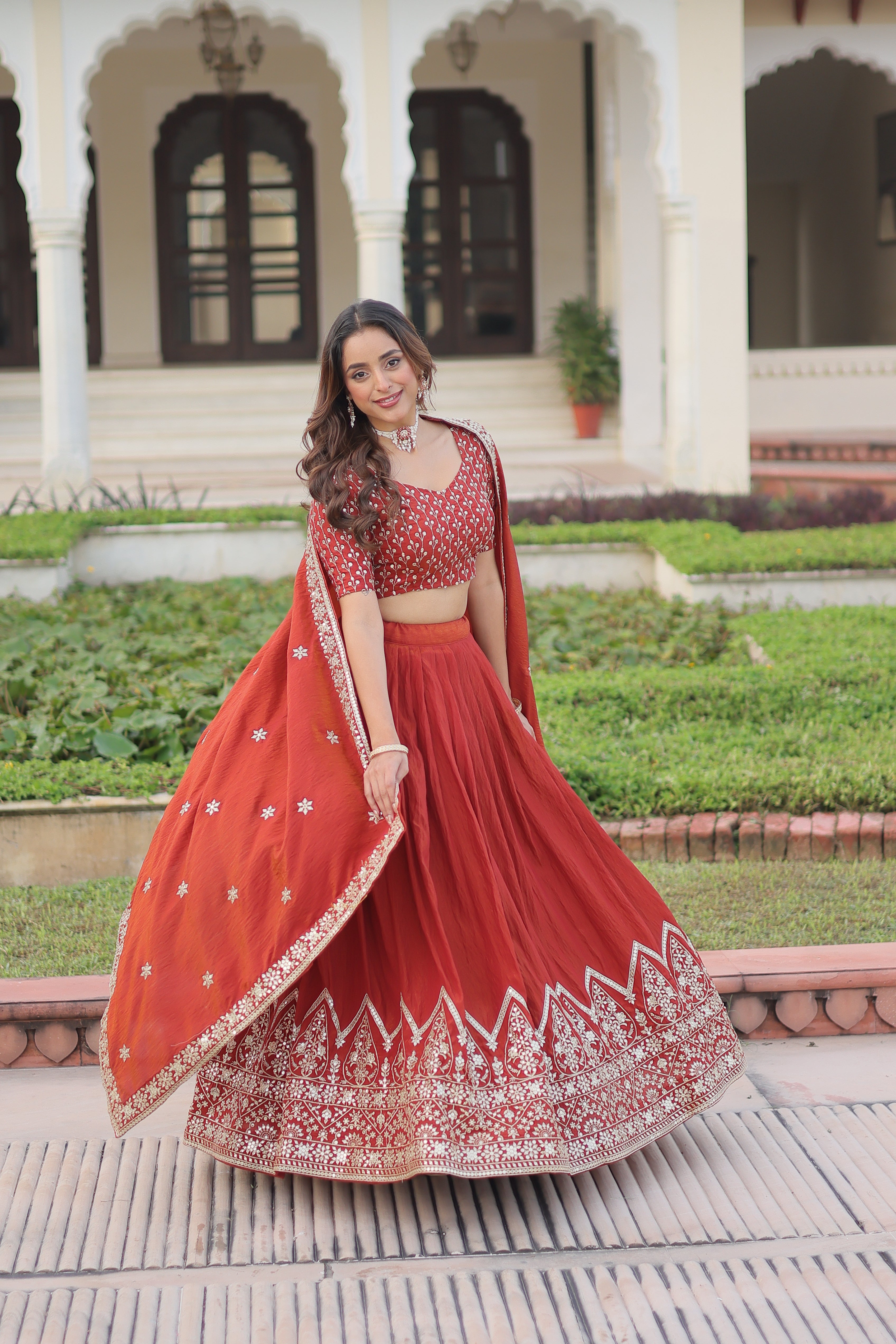 Omira orange Vichitra silk lehenga choli with sequins thread embroidery work