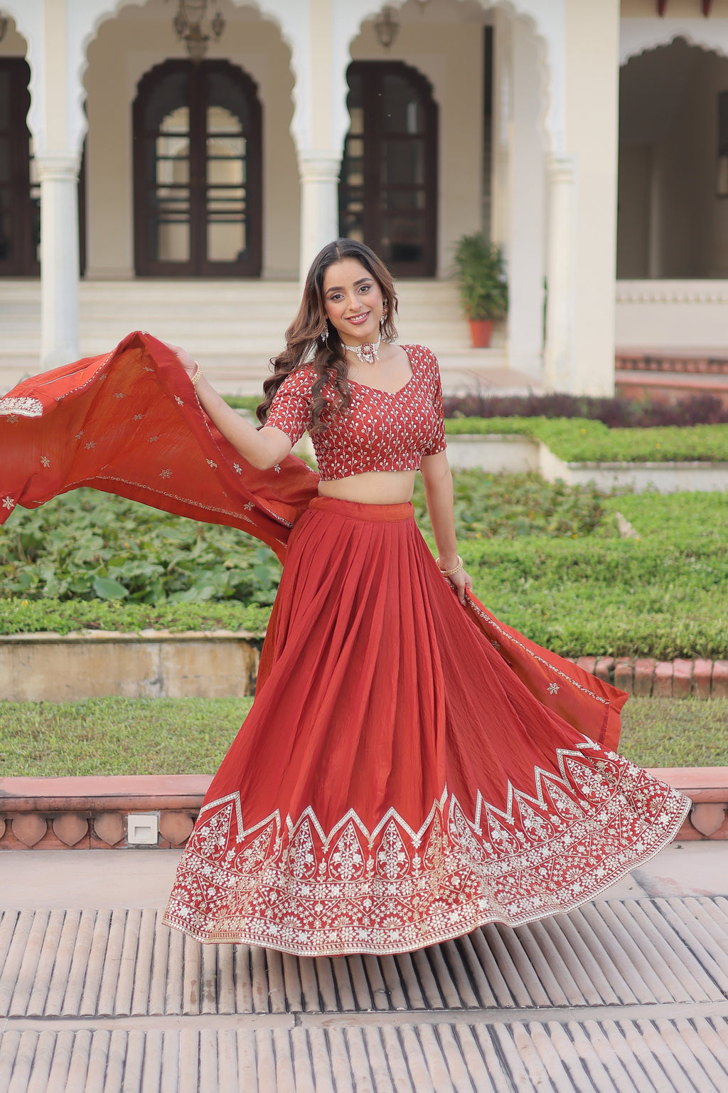 Omira orange Vichitra silk lehenga choli with sequins thread embroidery work